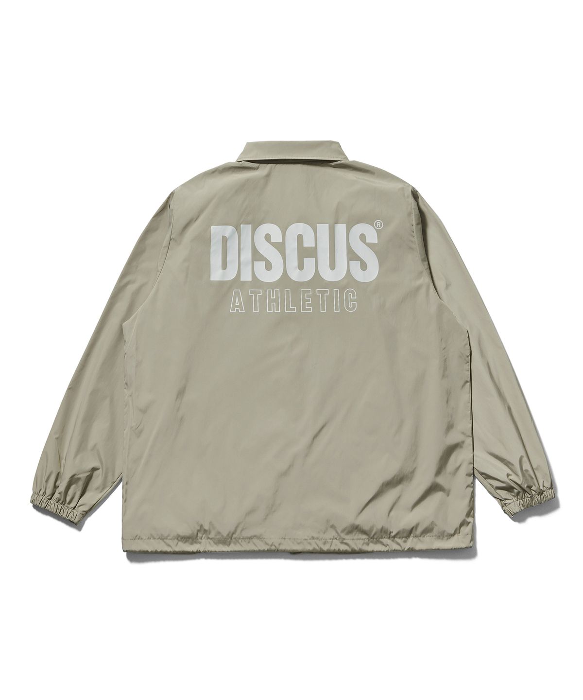 디스커스 애슬레틱(DISCUS ATHLETIC) 레터 로고 코치 자켓 샌드 베이지