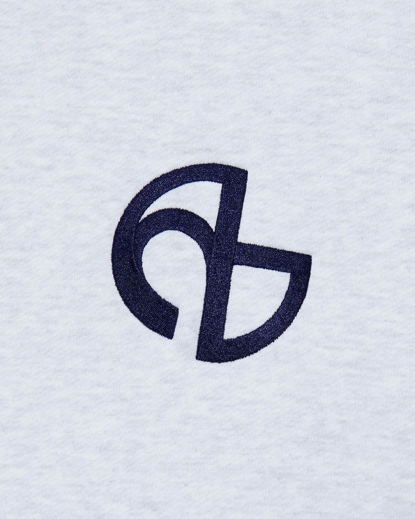 MUSINSA | NOMANUAL SYMBOL LOGO HOODED ZIP-UP - WHITE MELANGE
