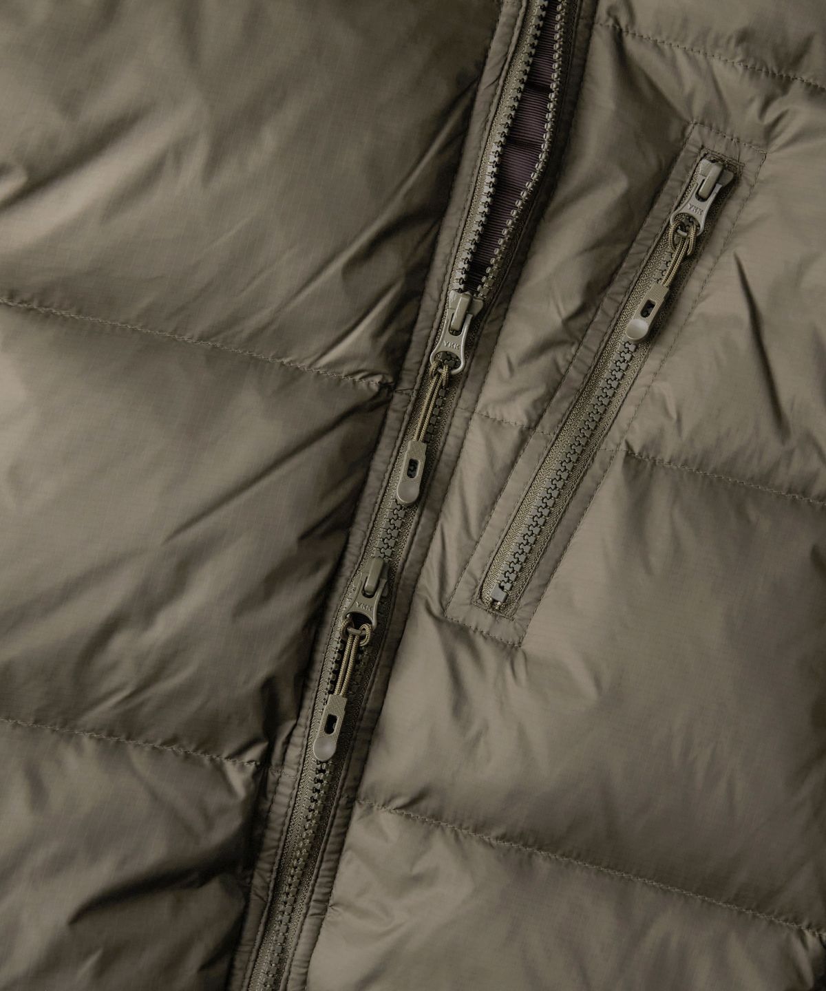 아웃스탠딩(OUTSTANDING) MOUNTAIN DOWN PARKA_BROWN