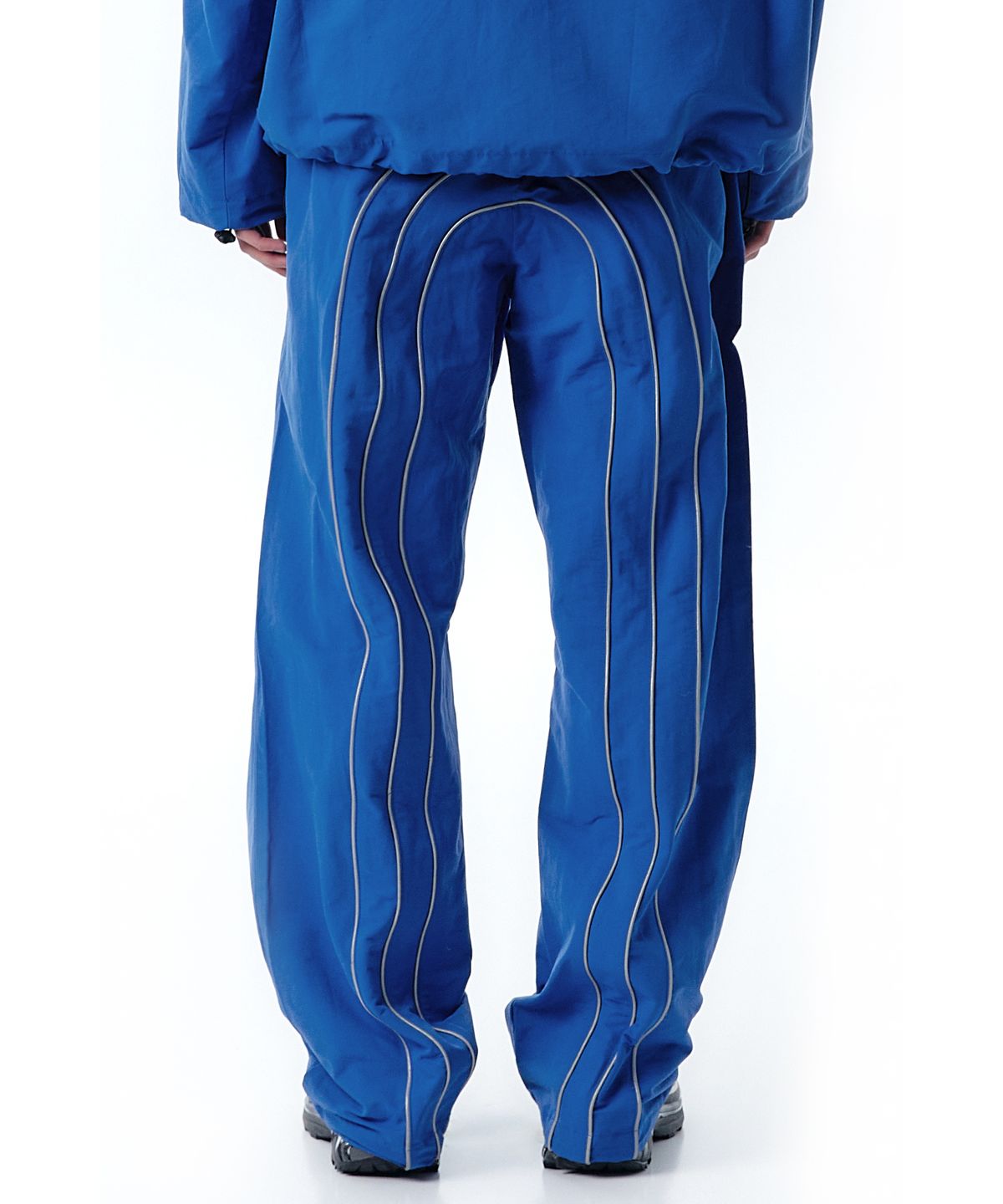 오픈야드(오와이)(OPENYARD(OY)) PIPING CURVE LINE TRACK PANTS-BLUE