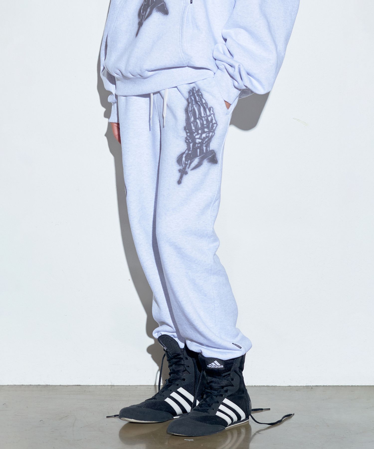 MUSINSA | SCULPTOR Praying Jogger Pants White Melange