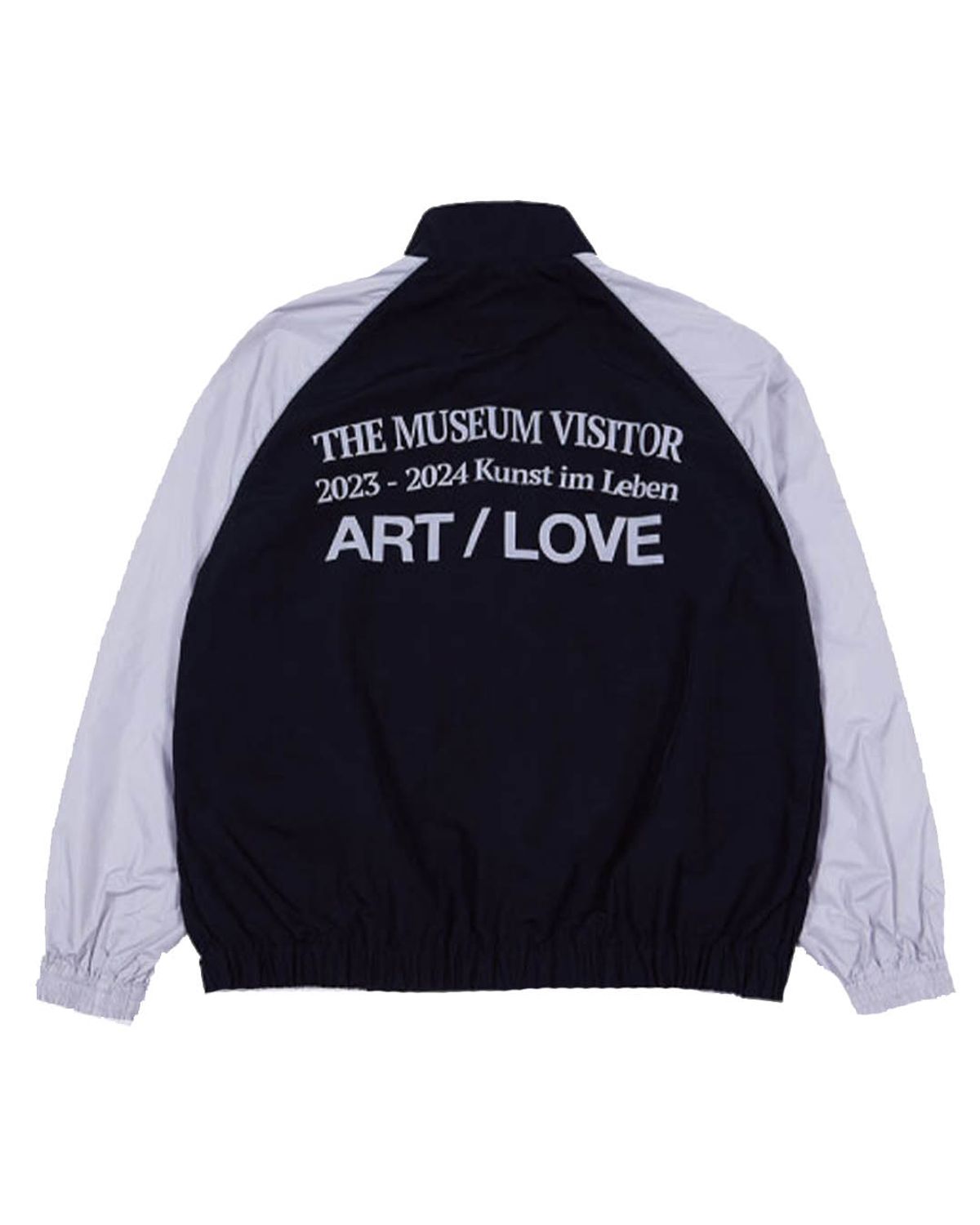 더뮤지엄비지터(THEMUSEUMVISITOR) REFLECTIVE LINE RAGLAN WINDBREAKER (BLACK)