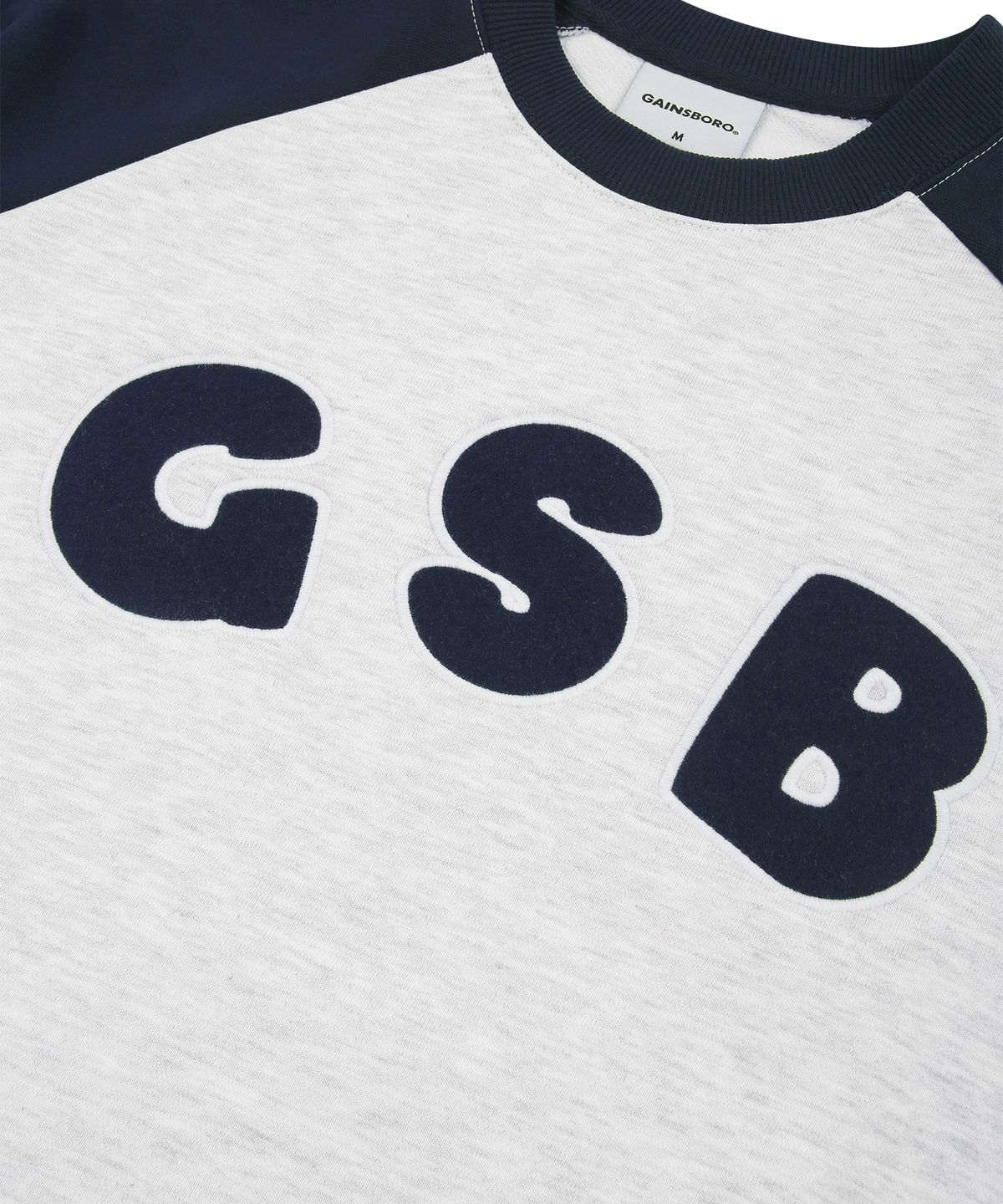 게인스보로(GAINSBORO) GSB로고 래글런 맨투맨_화이트멜란지/네이비