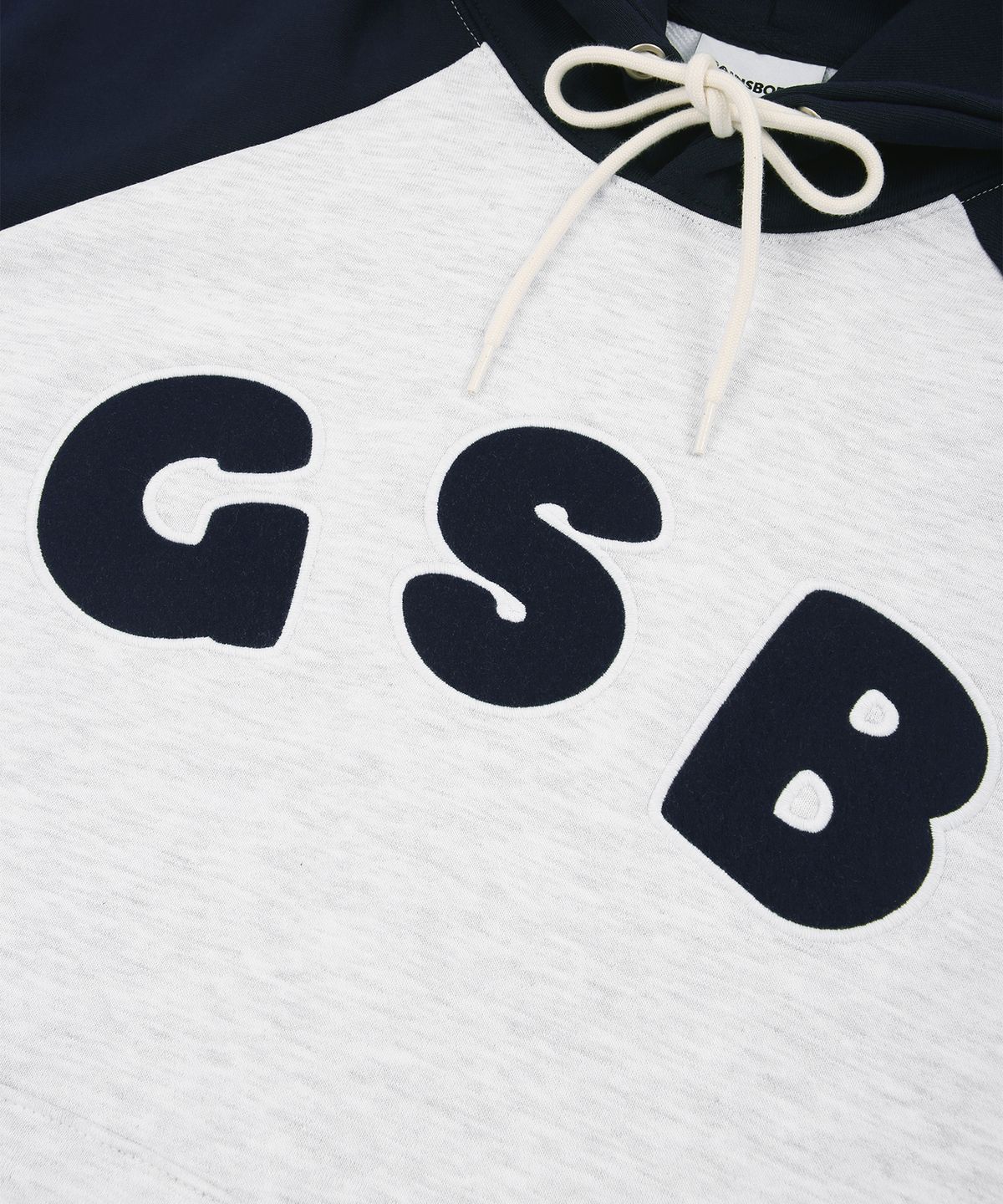 게인스보로(GAINSBORO) GSB로고 래글런 후드티_화이트멜란지/네이비