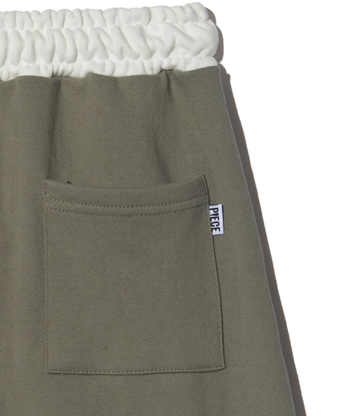 피스메이커(PIECE MAKER) OFFICIAL CARGO MIDI SKIRT (OLIVE)