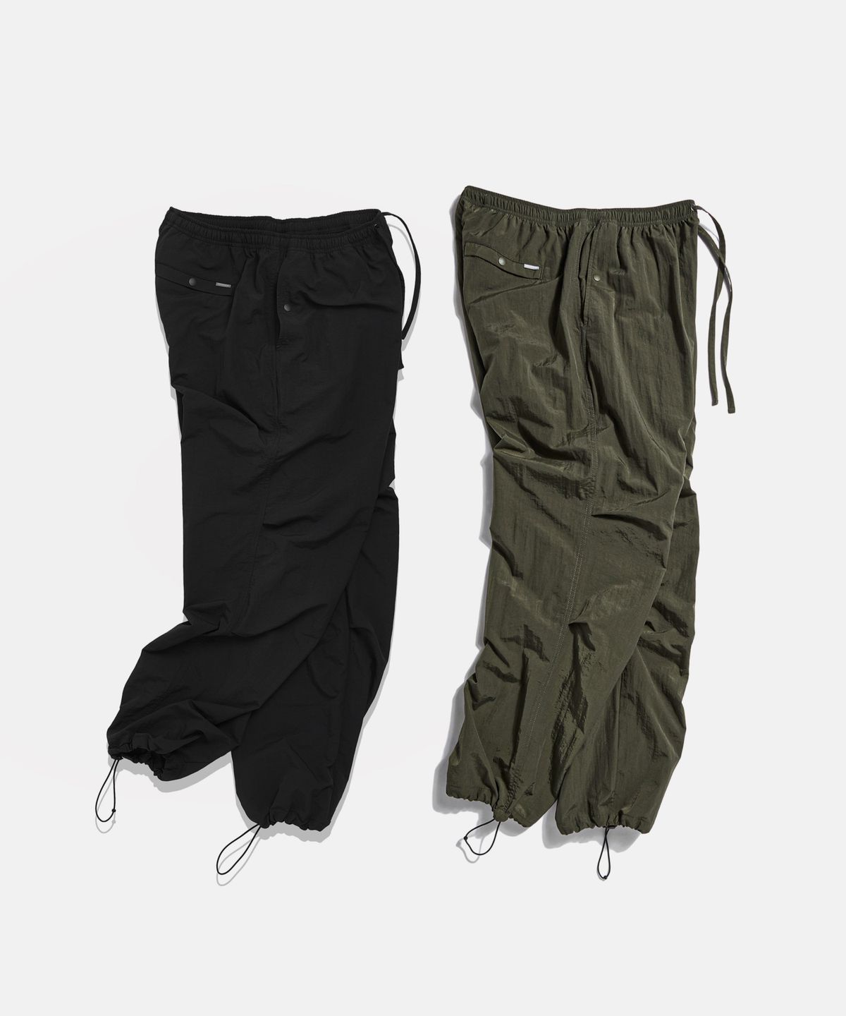 에스피오나지(ESPIONAGE) Nylon Warm Up Pants Dark Olive