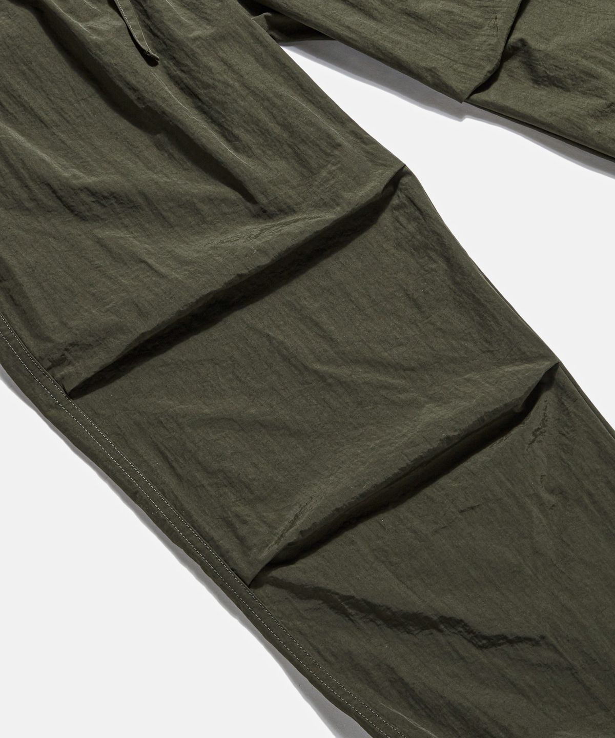 에스피오나지(ESPIONAGE) Nylon Warm Up Pants Dark Olive