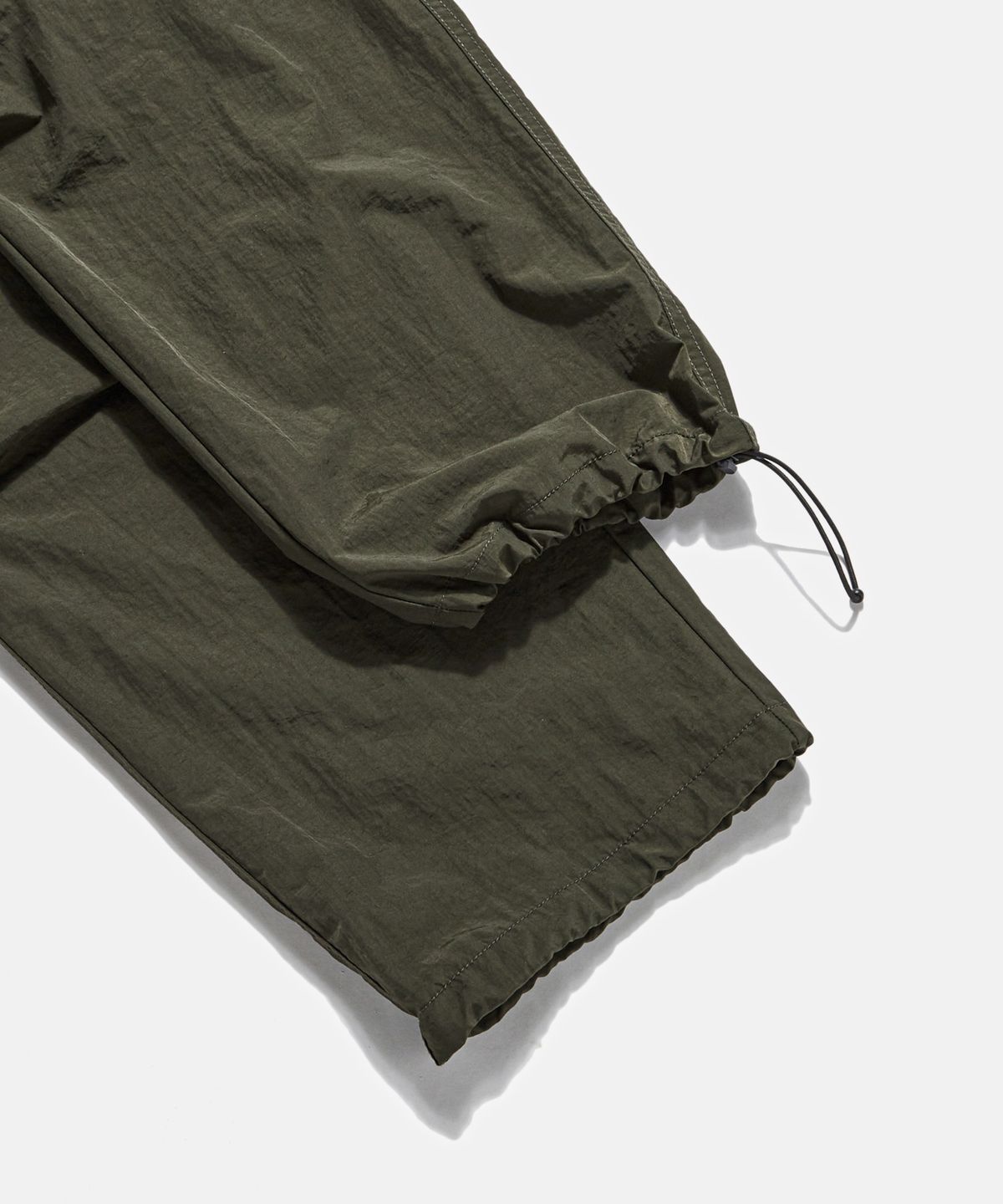 에스피오나지(ESPIONAGE) Nylon Warm Up Pants Dark Olive