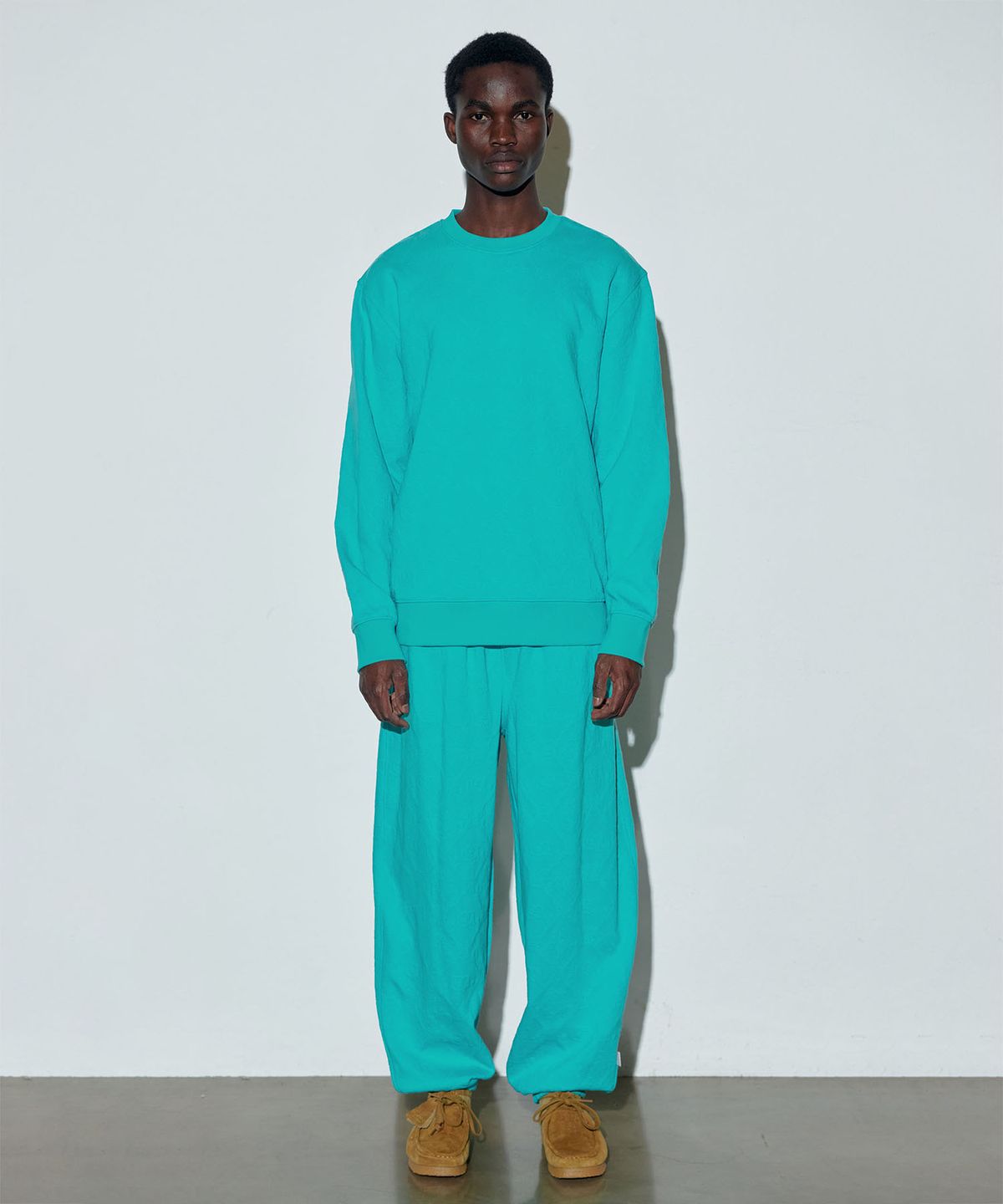 스컬프터(SCULPTOR) Jacquard Flower Jogger Pants Turquoise