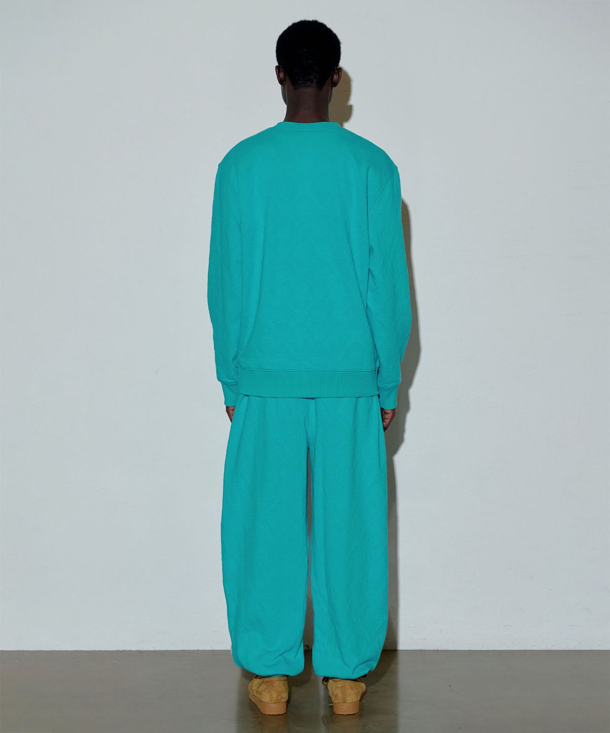 스컬프터(SCULPTOR) Jacquard Flower Jogger Pants Turquoise