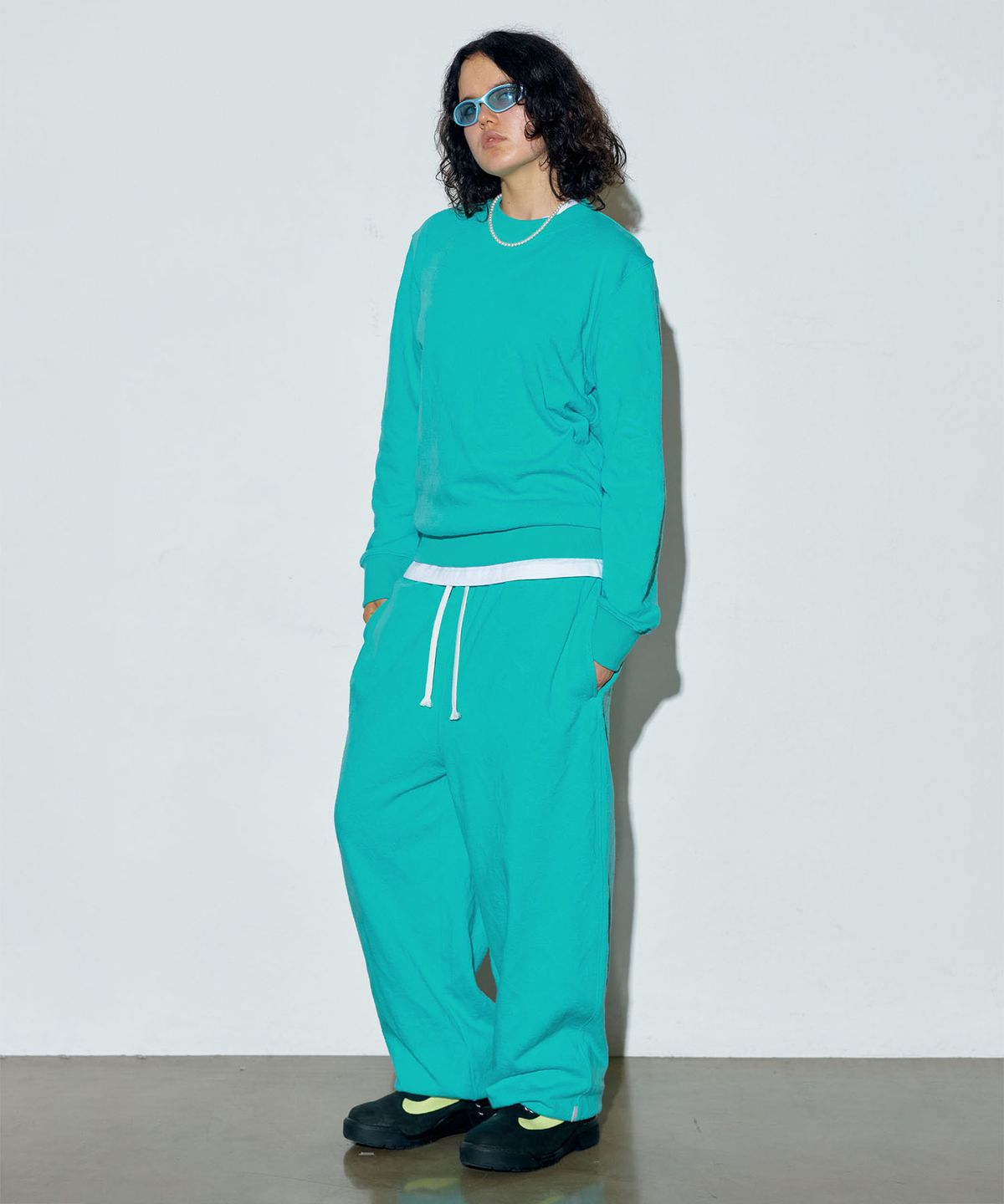 스컬프터(SCULPTOR) Jacquard Flower Jogger Pants Turquoise