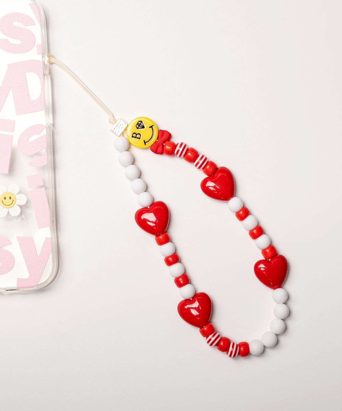 봉보(BONBEAU) Gentle smile heart phone strap 젠틀 스마일 리본 하트 폰 스트랩