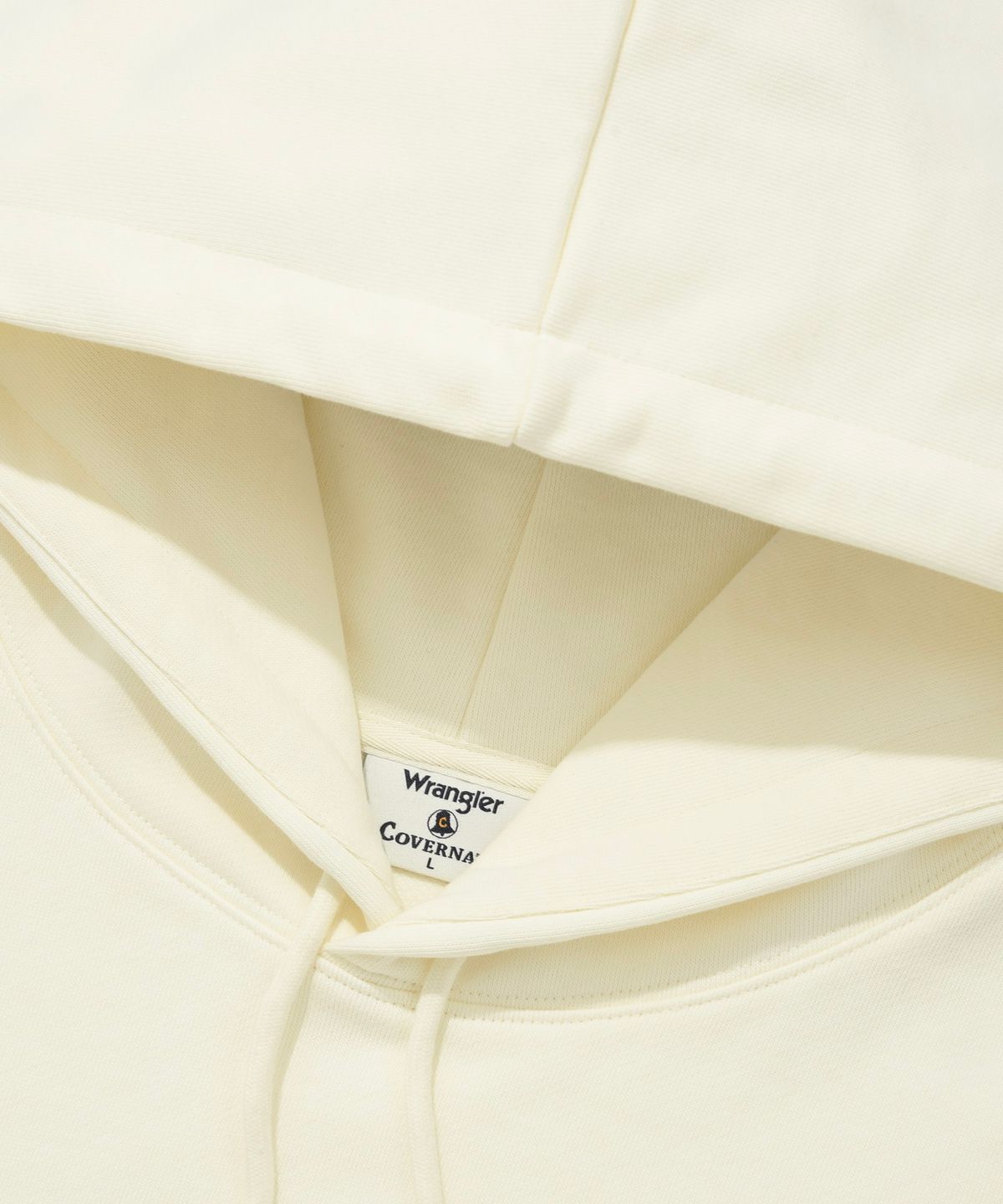 커버낫(COVERNAT) [COVERNAT X WRANGLER] 콜라보 아트웍 절개 배색 후디 네이비
