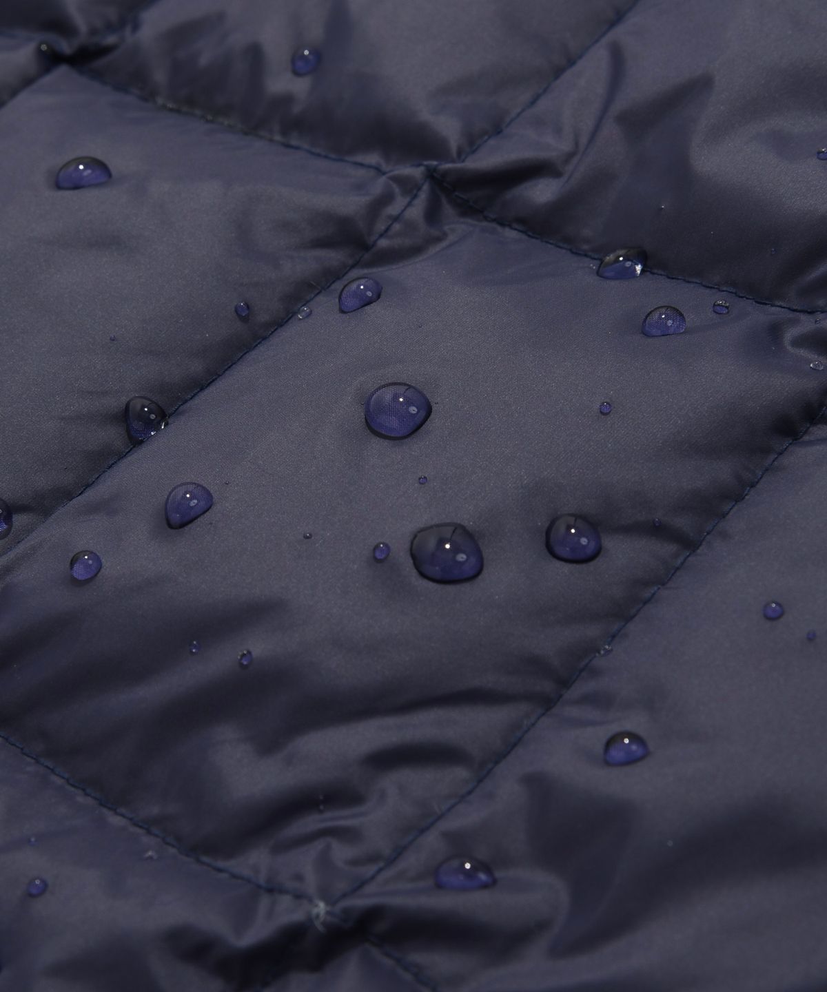 커버낫(COVERNAT) [COVERNAT X WRANGLER] 소매 절개 콜라보 아트웍 경량 패커블 덕 다운 네이비