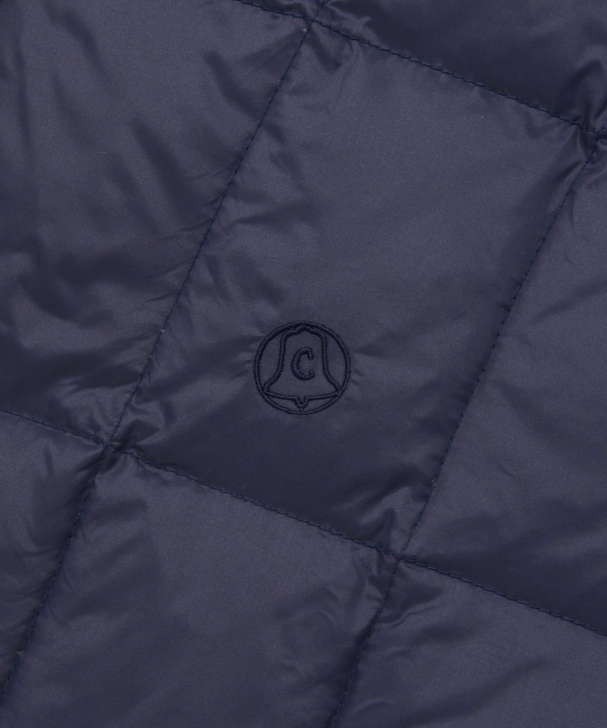 커버낫(COVERNAT) [COVERNAT X WRANGLER] 소매 절개 콜라보 아트웍 경량 패커블 덕 다운 네이비