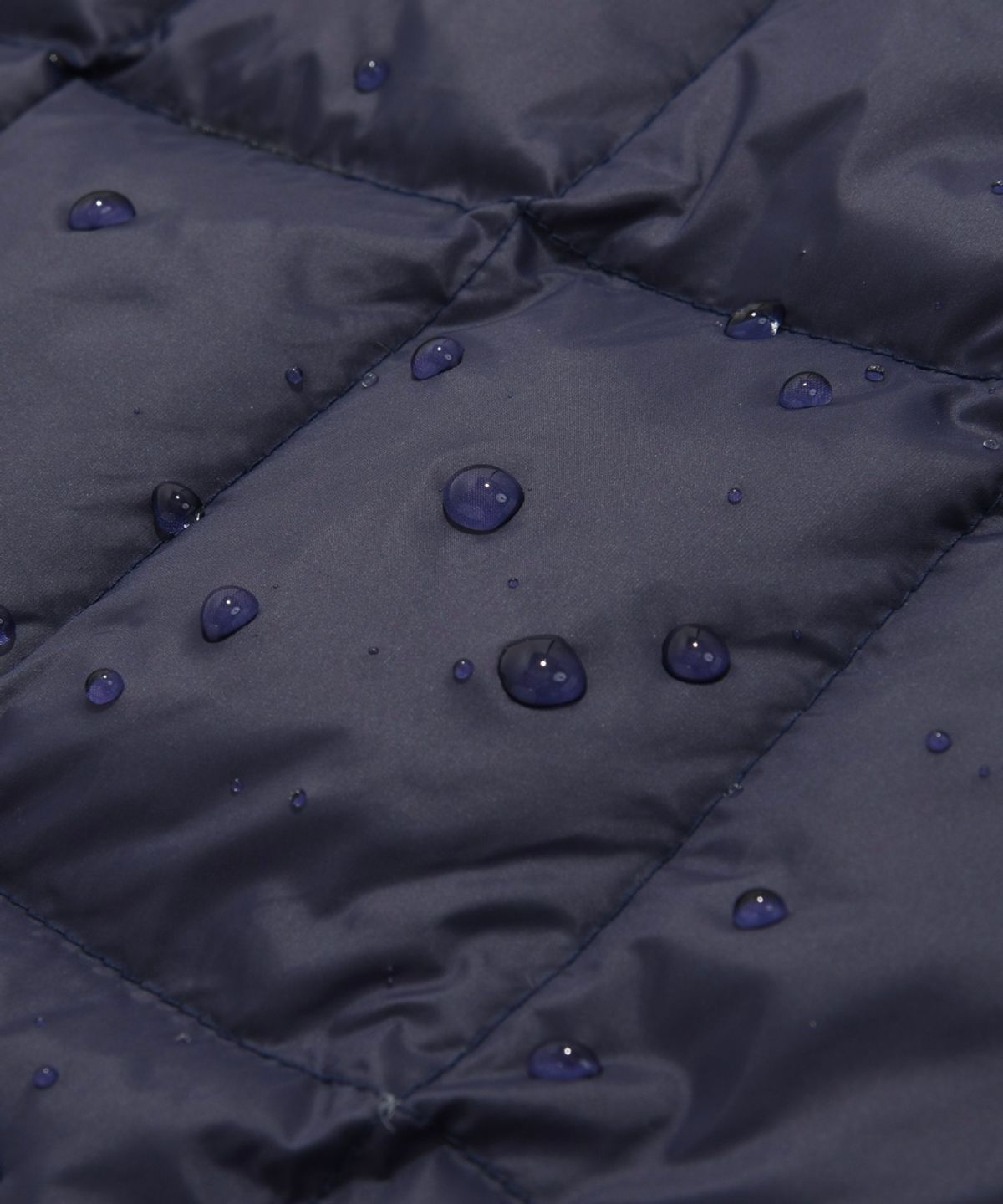 커버낫(COVERNAT) [COVERNAT X WRANGLER] 소매 절개 콜라보 아트웍 경량 패커블 덕 다운 네이비