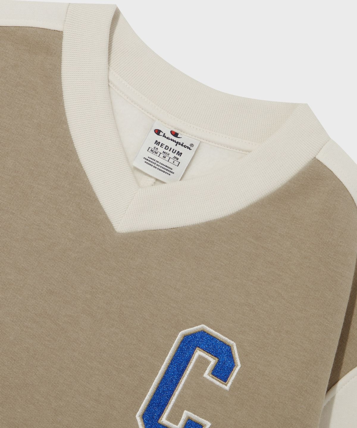 챔피온(CHAMPION) 컬러 블록 브이넥 스웨트셔츠 Normal Beige