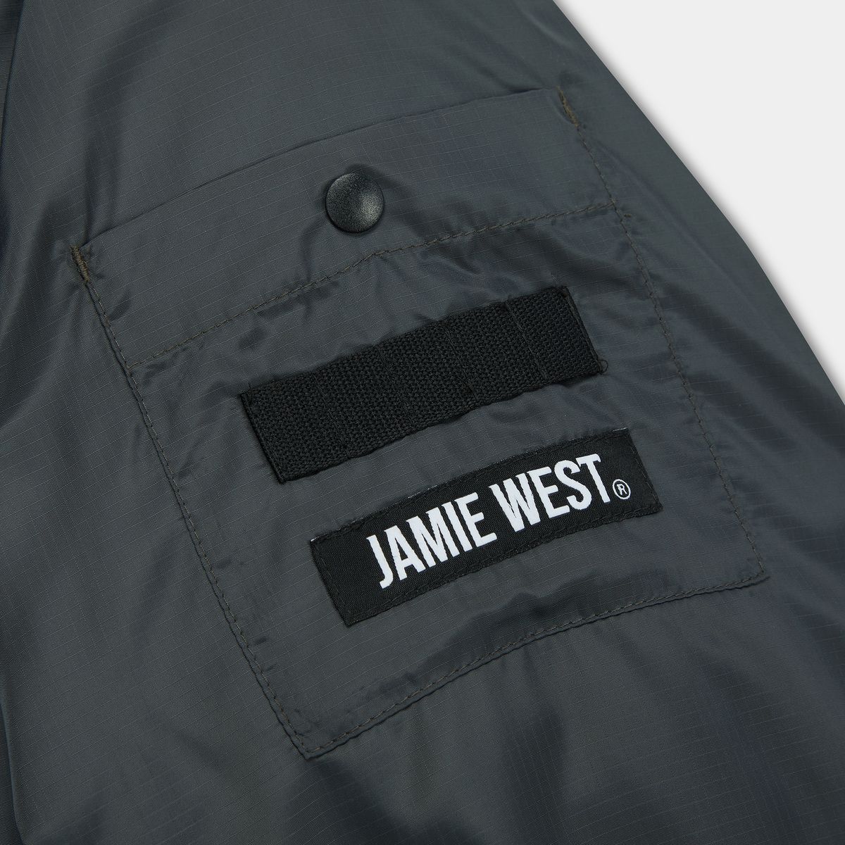 제이미웨스트(JAMIE WEST) 립스탑 리플렉티브 윈터 풀오버 (그레이)
