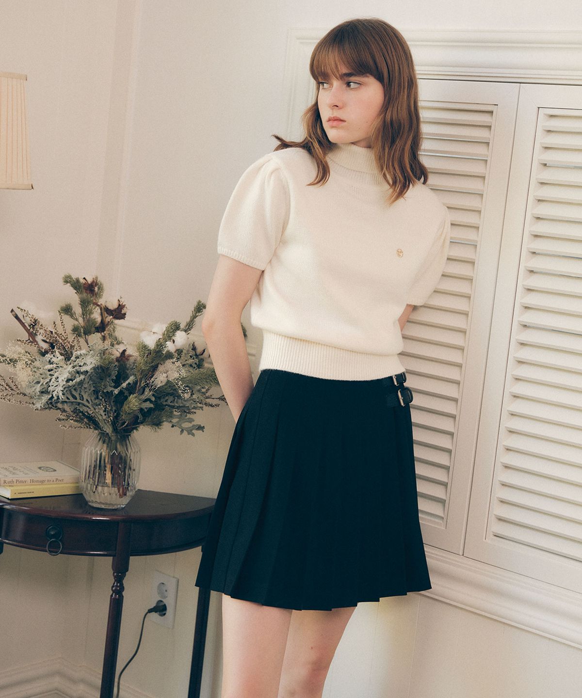 로라로라(ROLAROLA) BUCKLE POINTED SKIRT BLACK