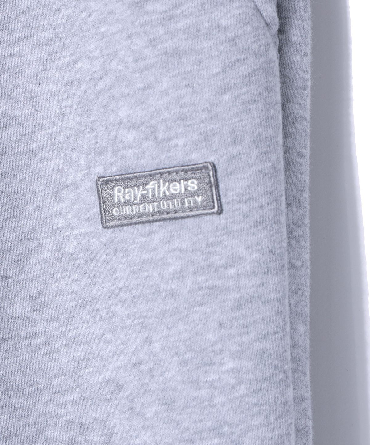 레이피커스(RAYFIKERS) 와펜 로고 와이드 원턱 스웨트 팬츠 MELANGE GREY (MO6PU181-097)