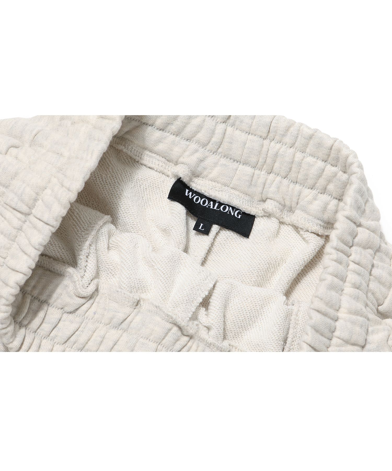 [WOOALONG]★ Signature jogger pants MUSINSA | WOOALONG Signature jogger pants - OAT MEAL