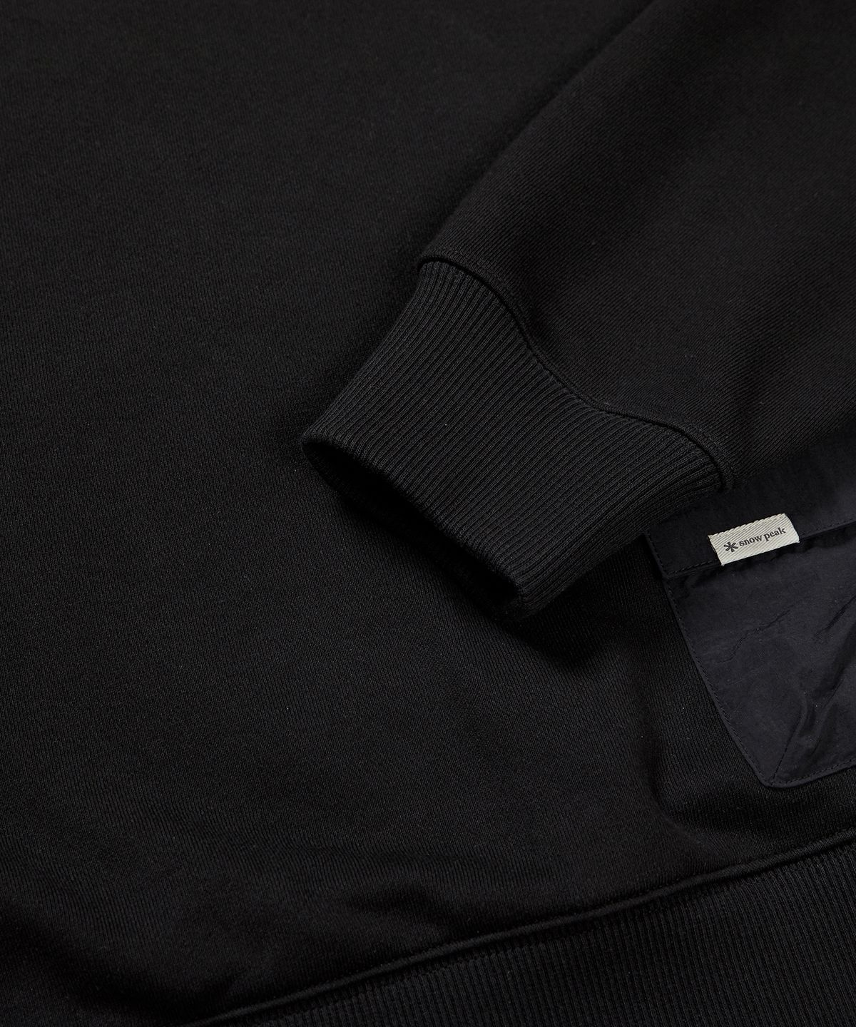 스노우피크 어패럴(SNOWPEAK APPAREL) 랜드 우먼스 우븐 포켓 기모 맨투맨 Black (S23FWFHT62)