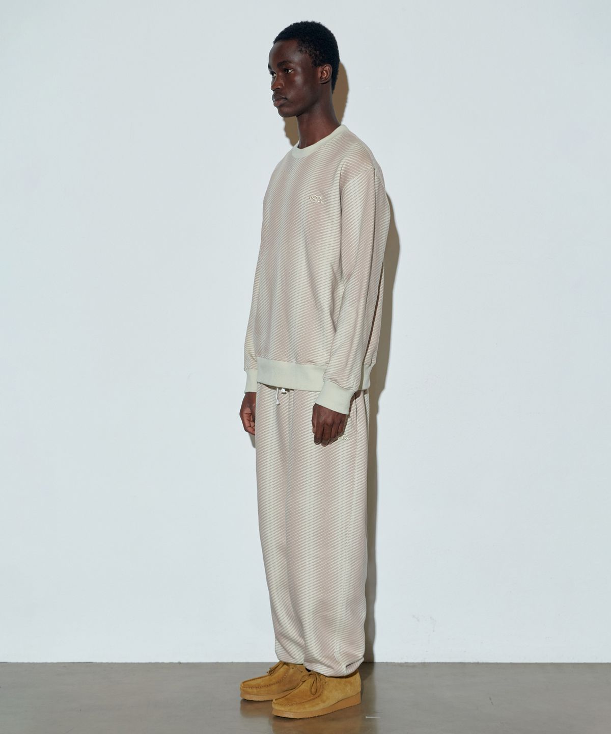 스컬프터(SCULPTOR) Irregular Stripe Jogger Pants Raw/Indie Pink