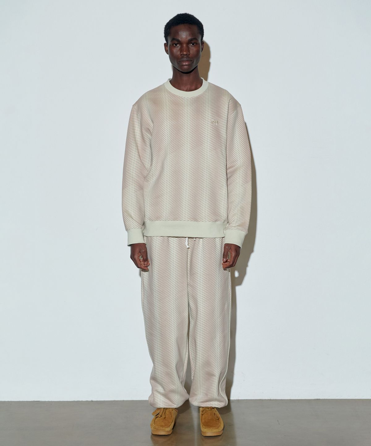 스컬프터(SCULPTOR) Irregular Stripe Jogger Pants Raw/Indie Pink