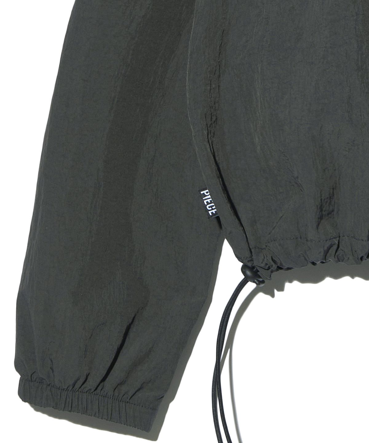 피스메이커(PIECE MAKER) NYLON SHIRRING WARM UP CREW (CHARCOAL)