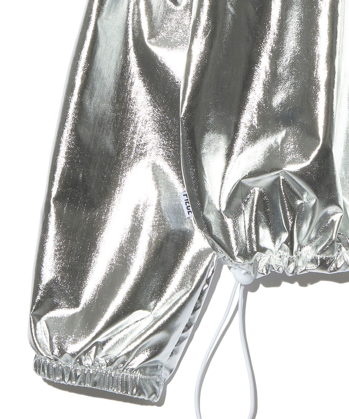 피스메이커(PIECE MAKER) NYLON SHIRRING WARM UP CREW (SILVER)