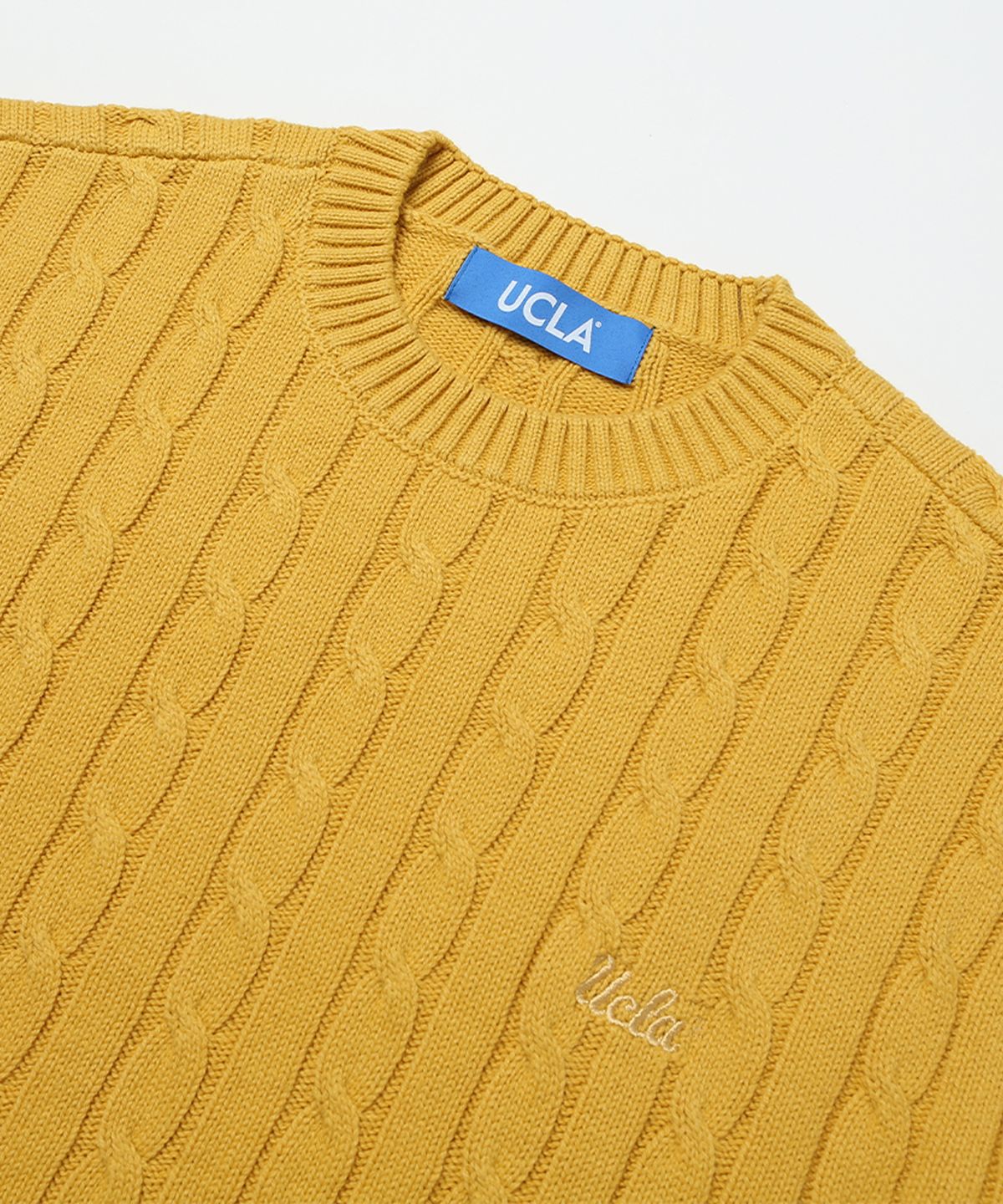 유씨엘에이(UCLA) 남여공용 라운드넥 꽈배기 케이블 니트[YELLOW](UZALK8A_75)
