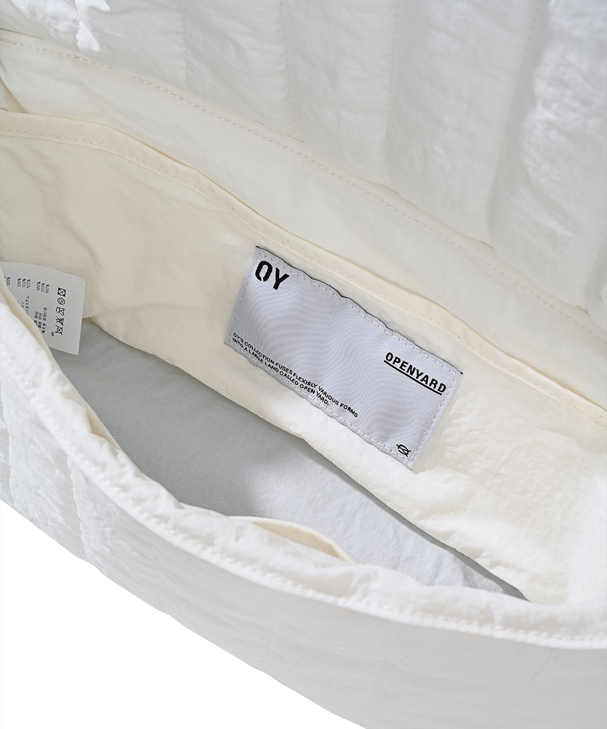 오픈야드(오와이)(OPENYARD(OY)) PADDING TIE CROSS BAG-WHITE