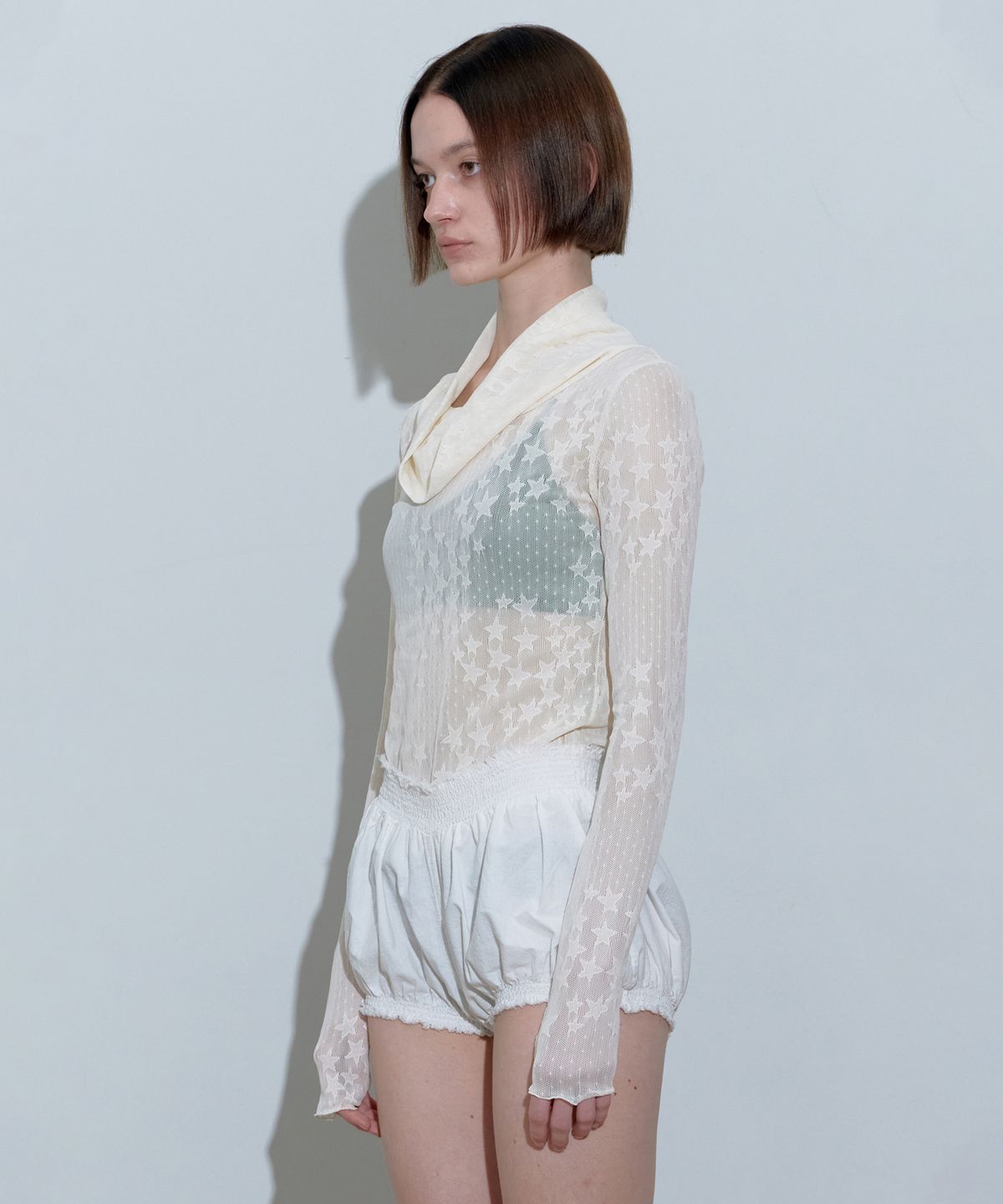 스컬프터(SCULPTOR) Star Shirring Turtleneck Ivory