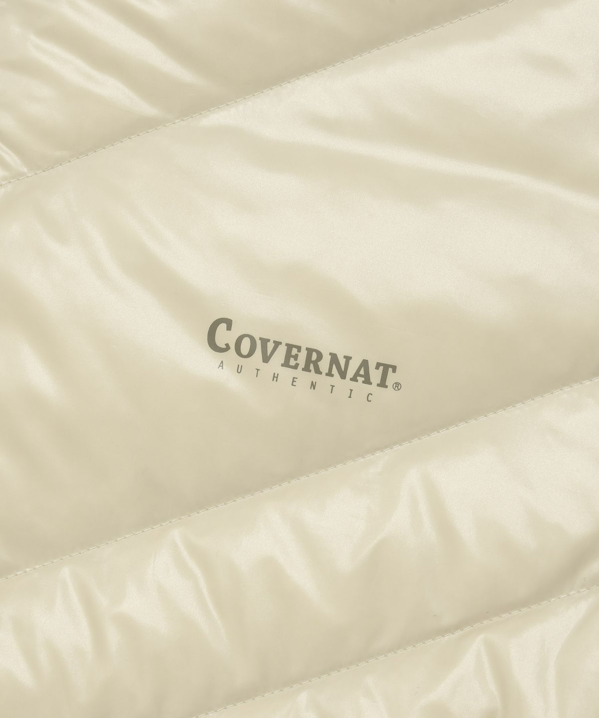 커버낫(COVERNAT) 패커블 경량 다운 아이보리