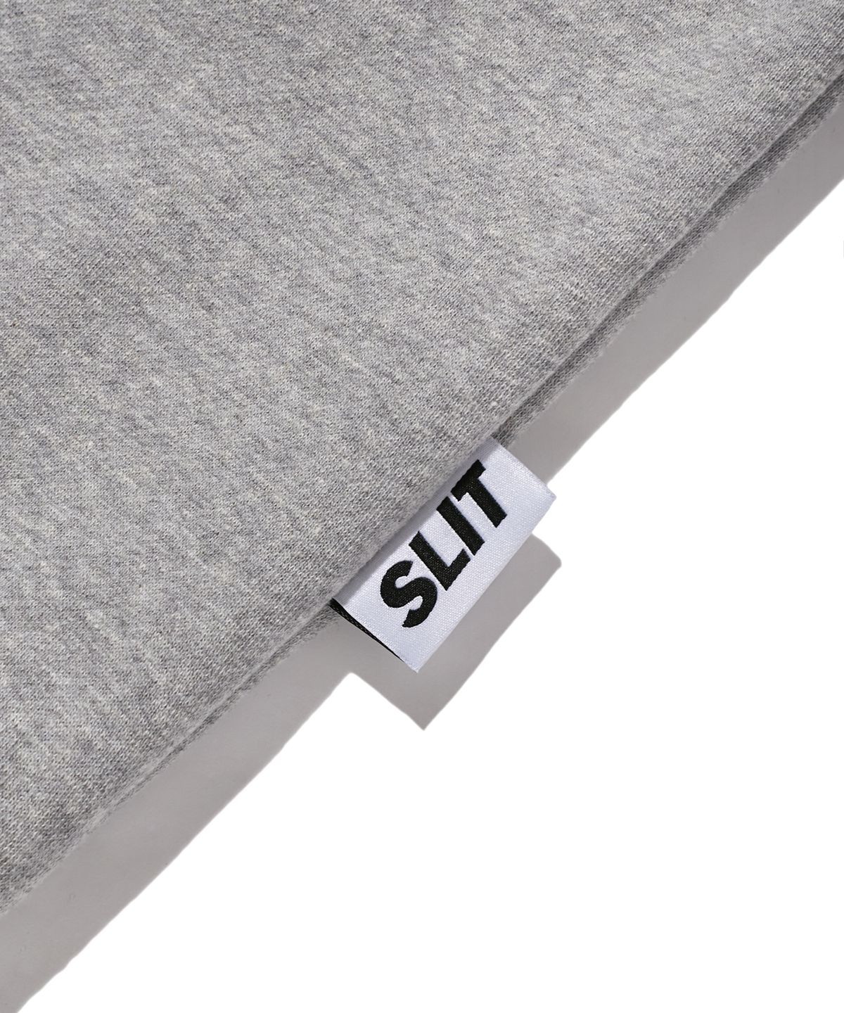 에스릿 스튜디오(SLIT STUDIO) 레터링 포켓 기모 스웨트 셔츠 멜란지