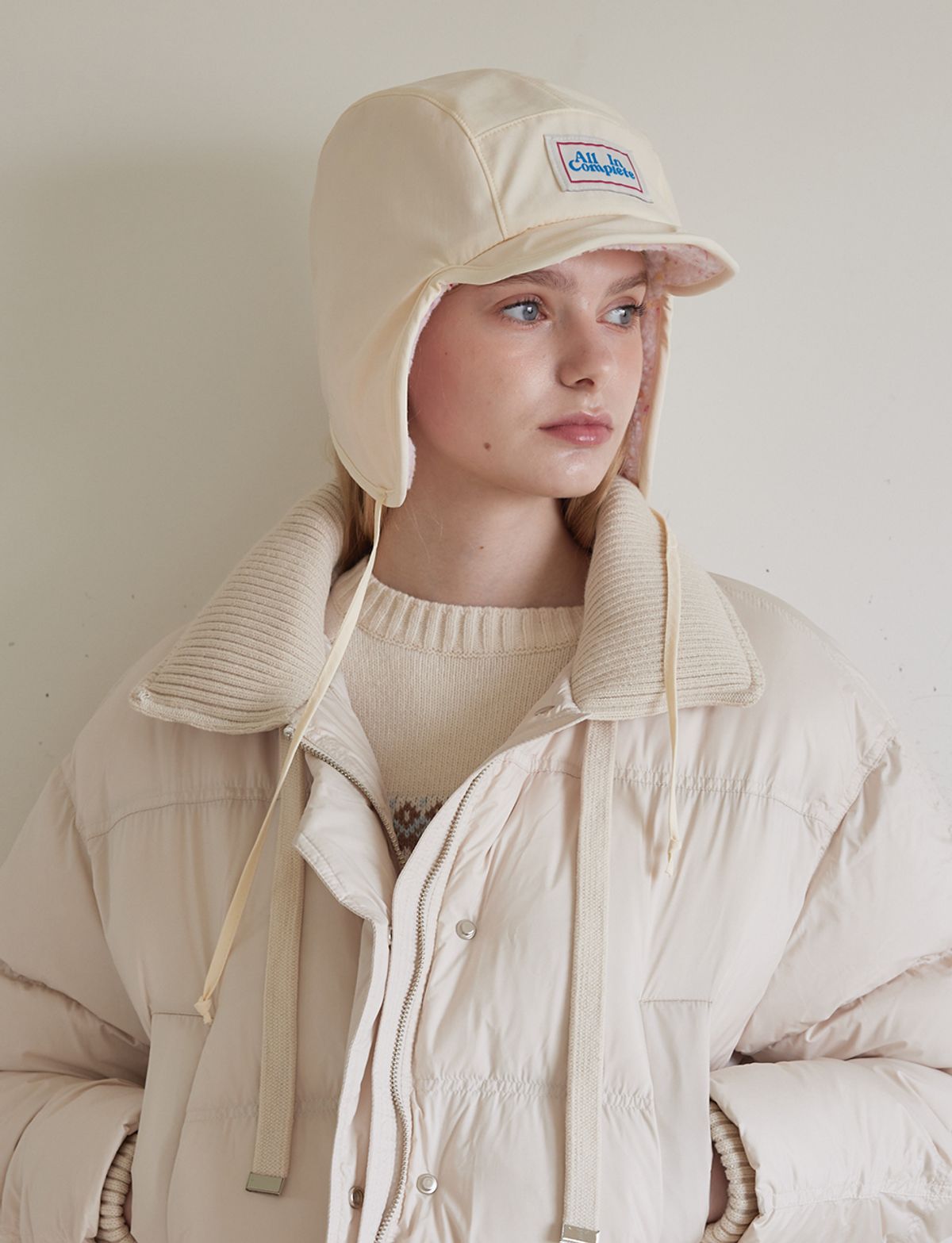 올인컴플리트(ALLINCOMPLETE) 스프링클 테디 리버서블 트루퍼햇 (아이보리)