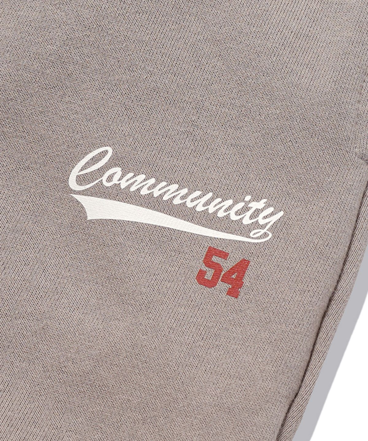 더마일(THEMILE) COMMUNITY 54 SWEAT PANTS[BROWN]