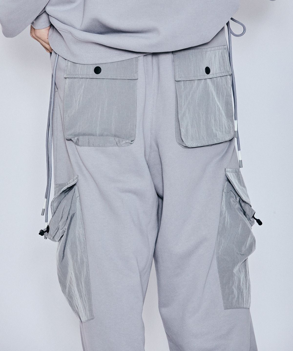 밀리밀리언(MILLIMILLION) BASALT HYBRID JERSEY PANTS B07-GREY