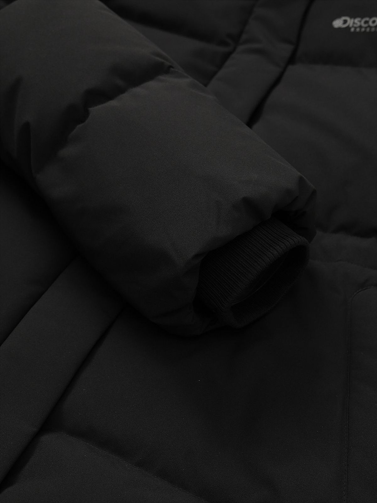 디스커버리 익스페디션(DISCOVERY EXPEDITION) 여성 켈리 구스다운 롱패딩 (BLACK)