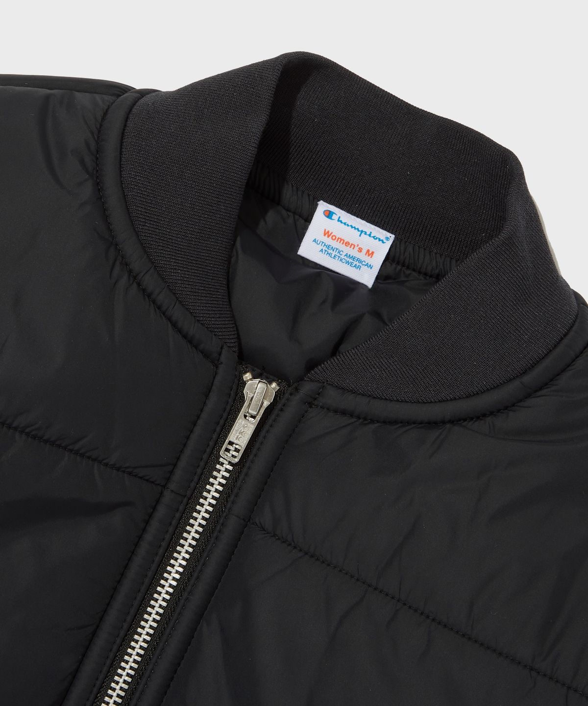 챔피온(CHAMPION) 여성 언발란스 타프타 패딩 자켓 Black