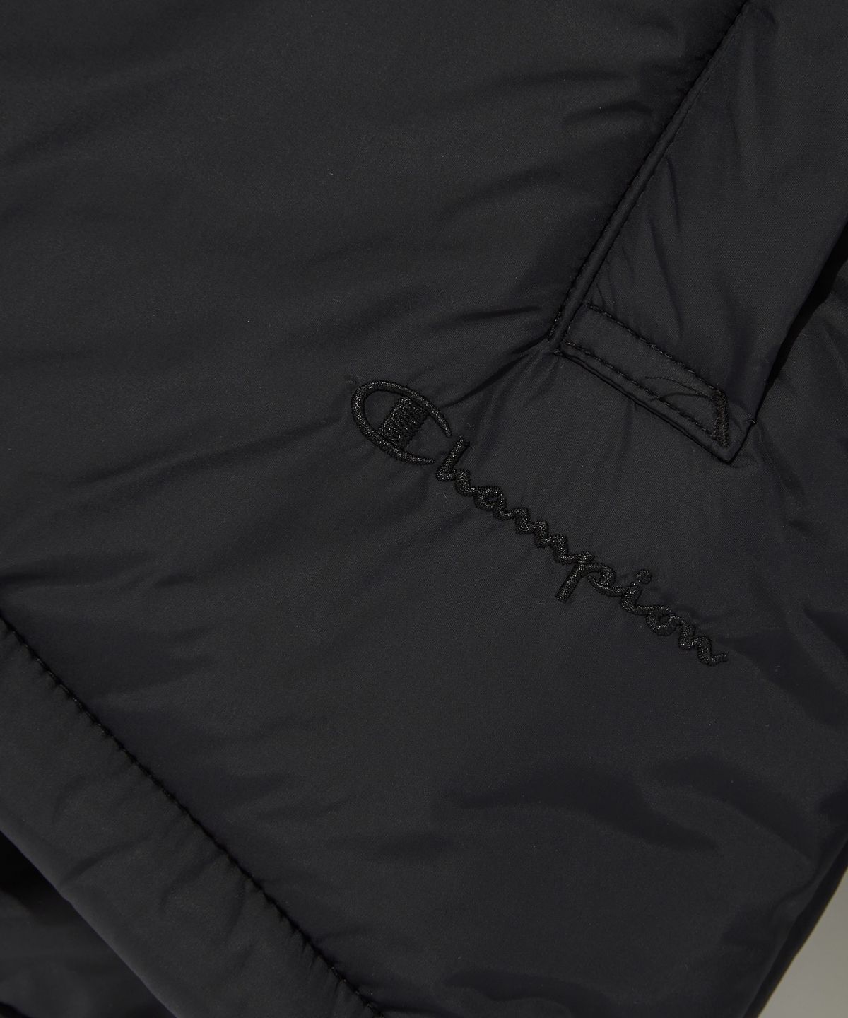 챔피온(CHAMPION) 여성 언발란스 타프타 패딩 자켓 Black