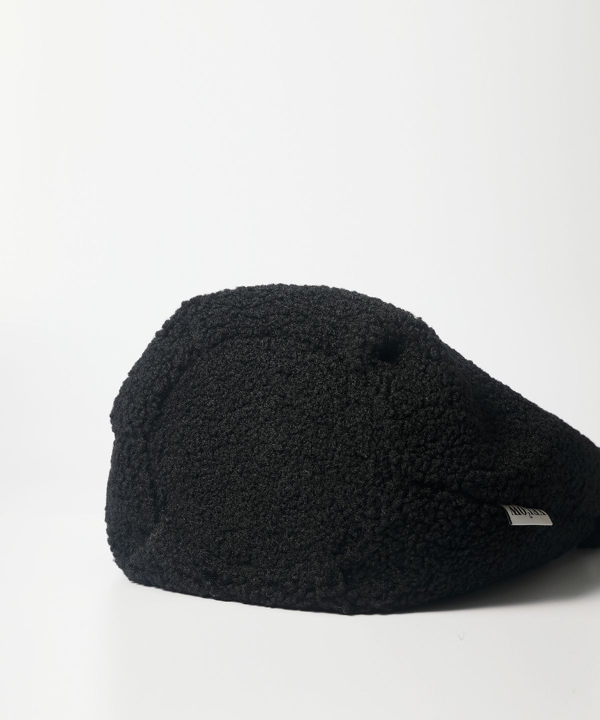 옐로우스톤(YELLOWSTONE) Wool dumpling wrist bag - Black