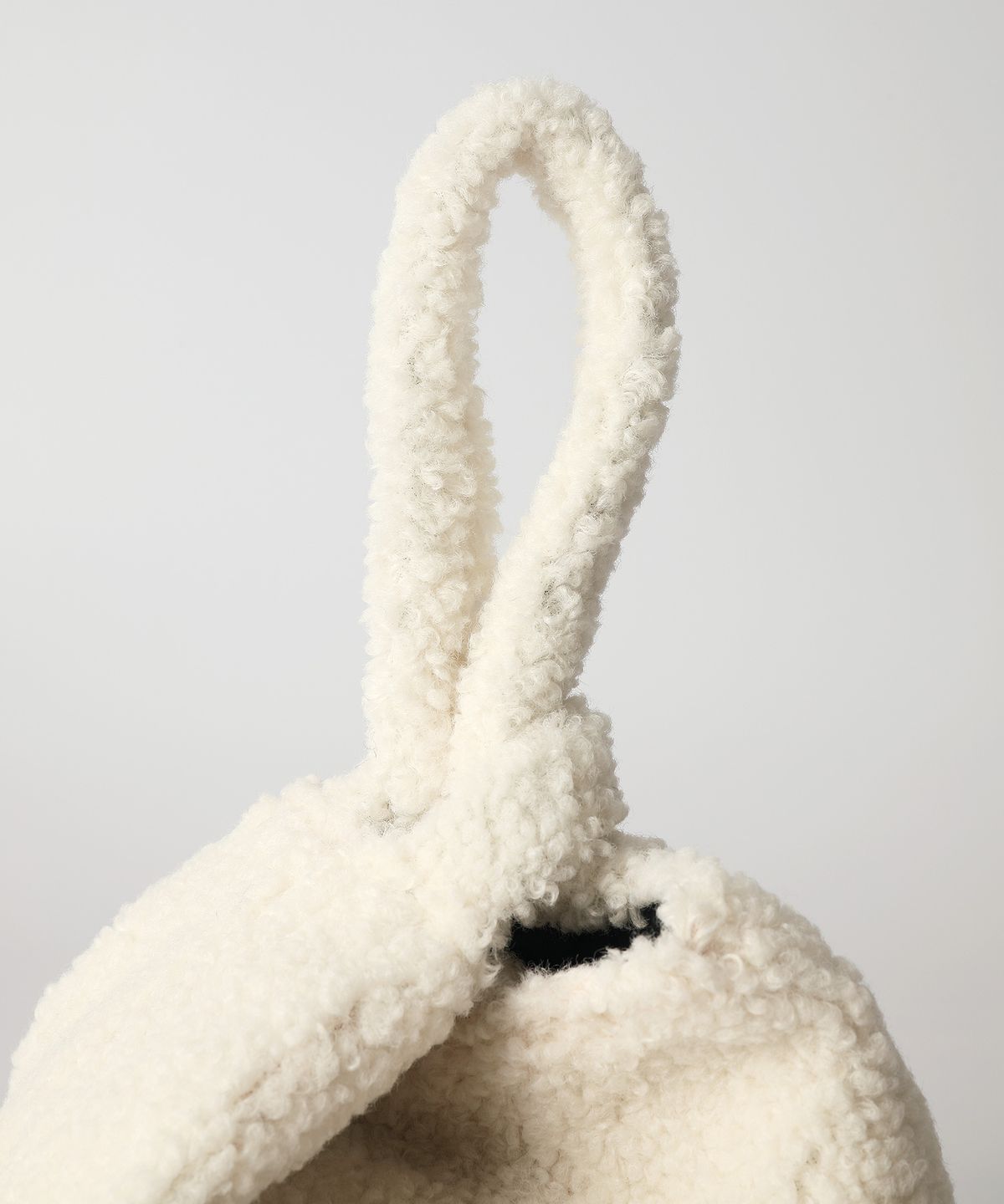 옐로우스톤(YELLOWSTONE) Wool dumpling wrist bag - Ivory