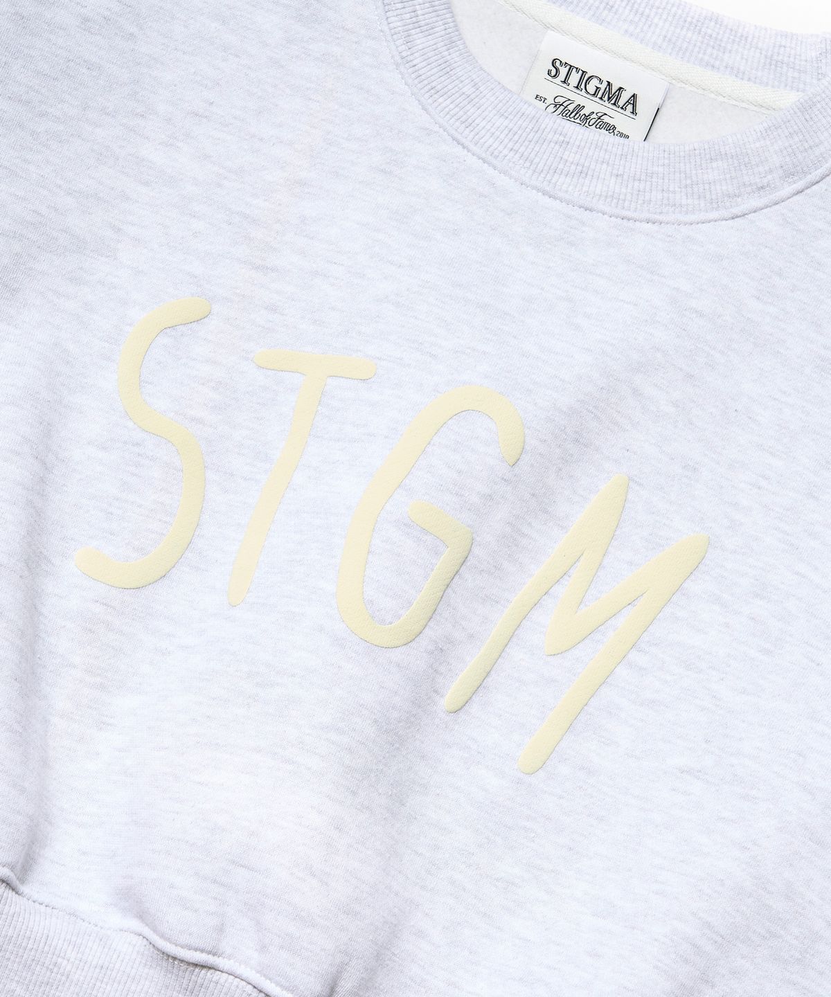 스티그마(STIGMA) STGM CROPED CREWNECK(FEMALE) WHITE MELANGE