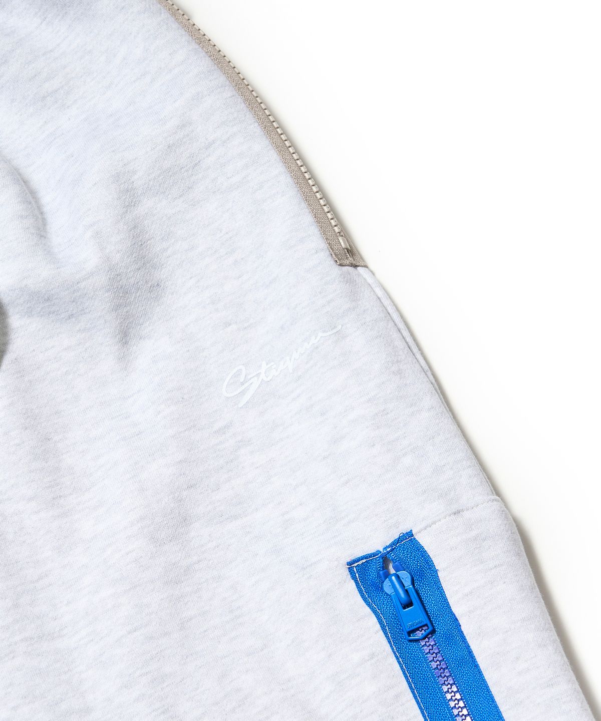 스티그마(STIGMA) ZIPPER WIDE JOGGER PANTS WHITE MELANGE