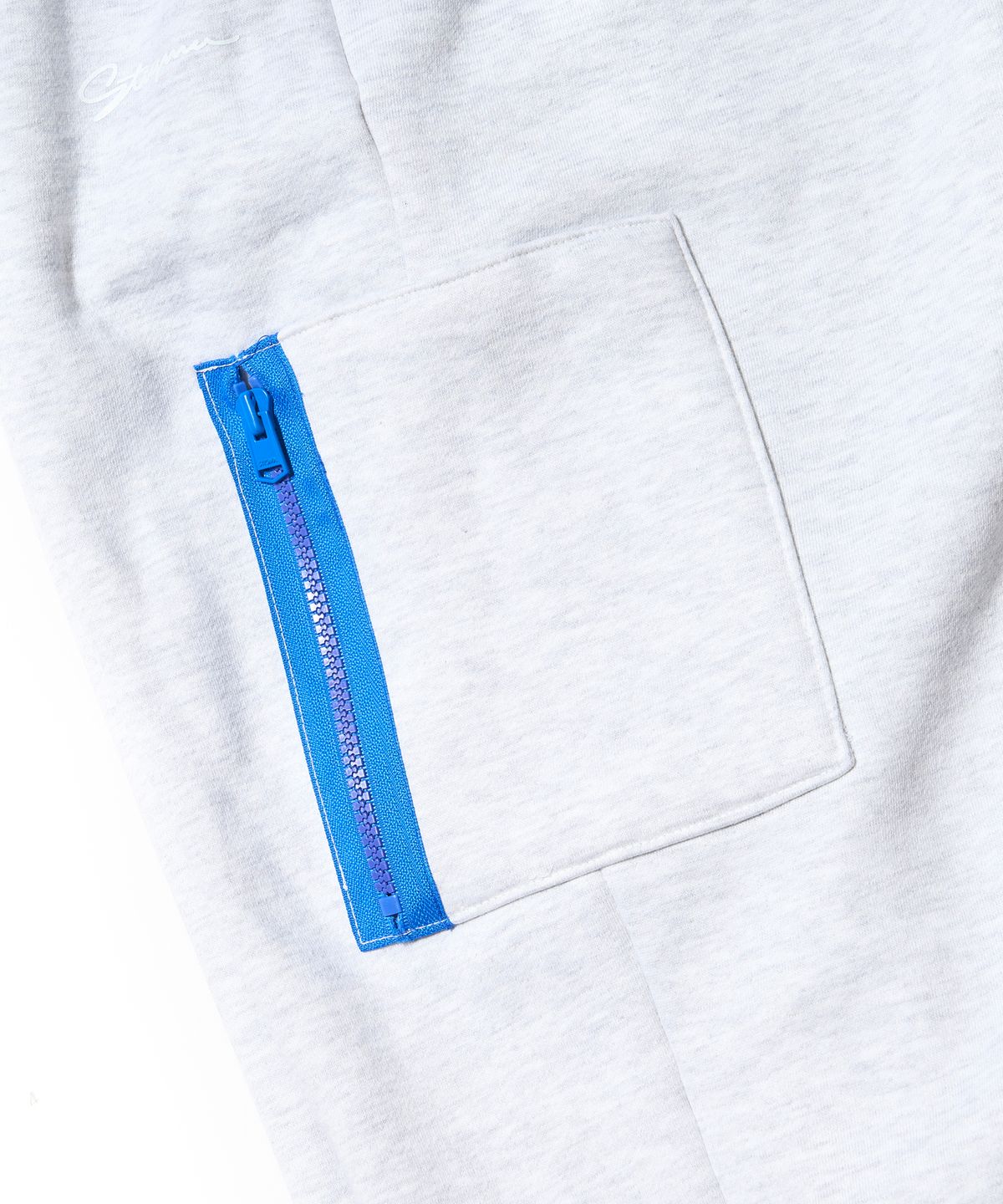 스티그마(STIGMA) ZIPPER WIDE JOGGER PANTS WHITE MELANGE