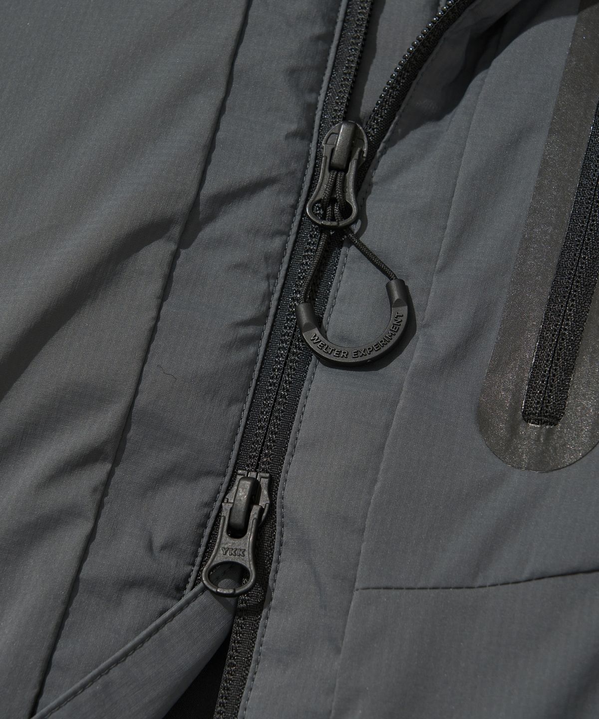 웰터 익스페리먼트(WELTER EXPERIMENT) LIGHT PRIMALOFT HOOD JACKET_CHARCOAL_WOL041