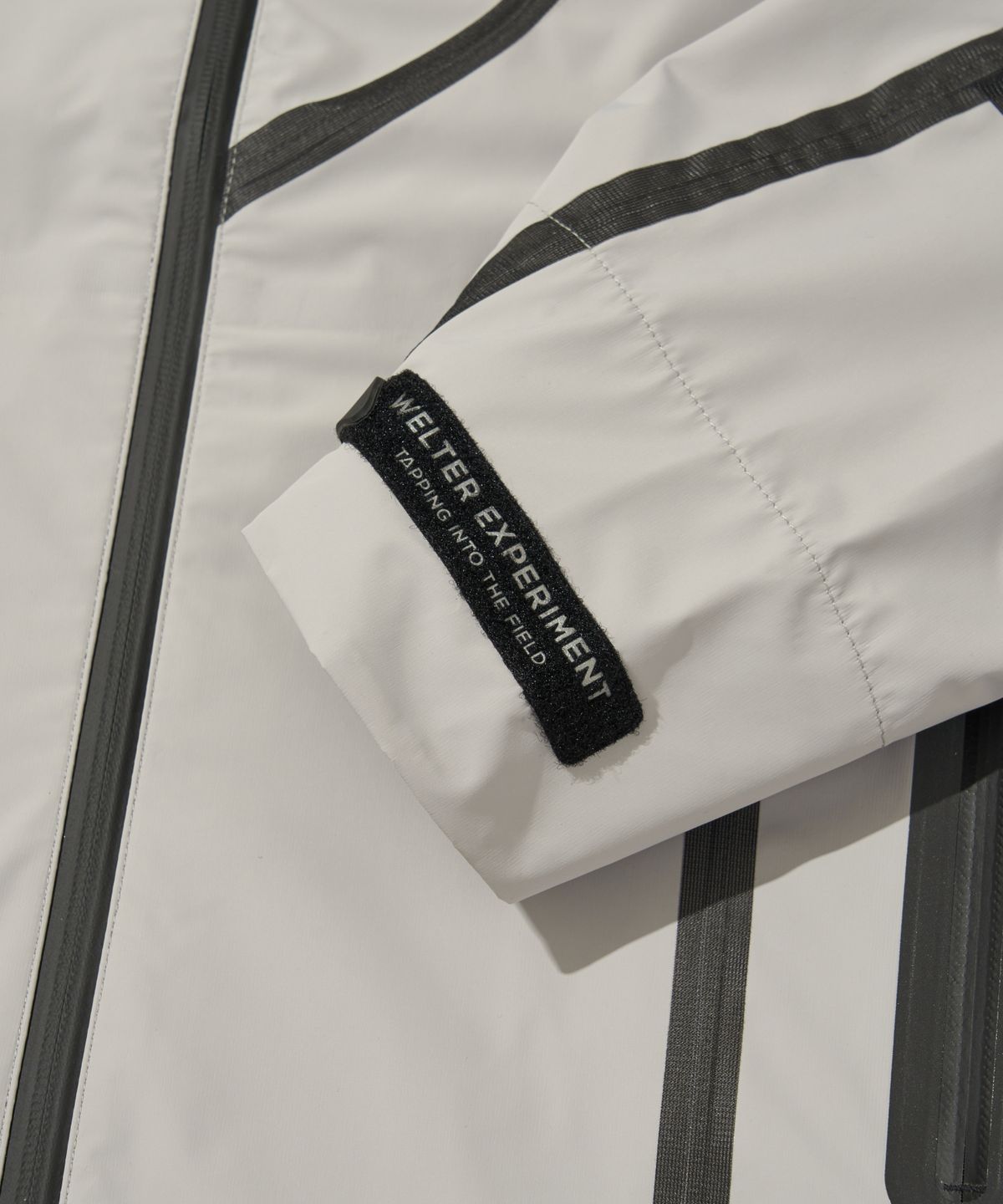 웰터 익스페리먼트(WELTER EXPERIMENT) WOL022_3LAYER SEAMSEALING HOOD SHELL JACKET_Gray_White