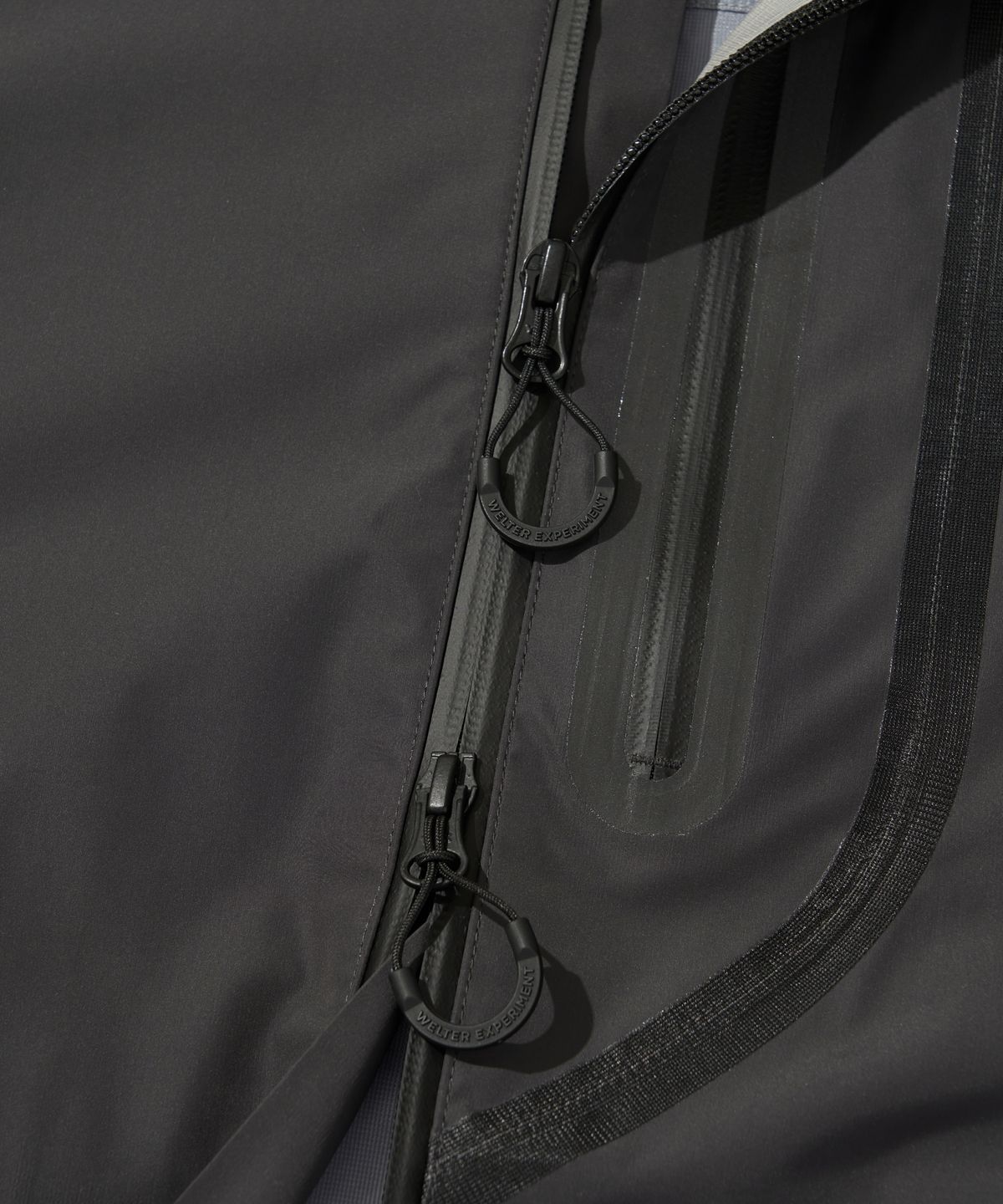 웰터 익스페리먼트(WELTER EXPERIMENT) WOL023_3LAYER SEAMSEALING HOOD SHELL JACKET_Charcoal