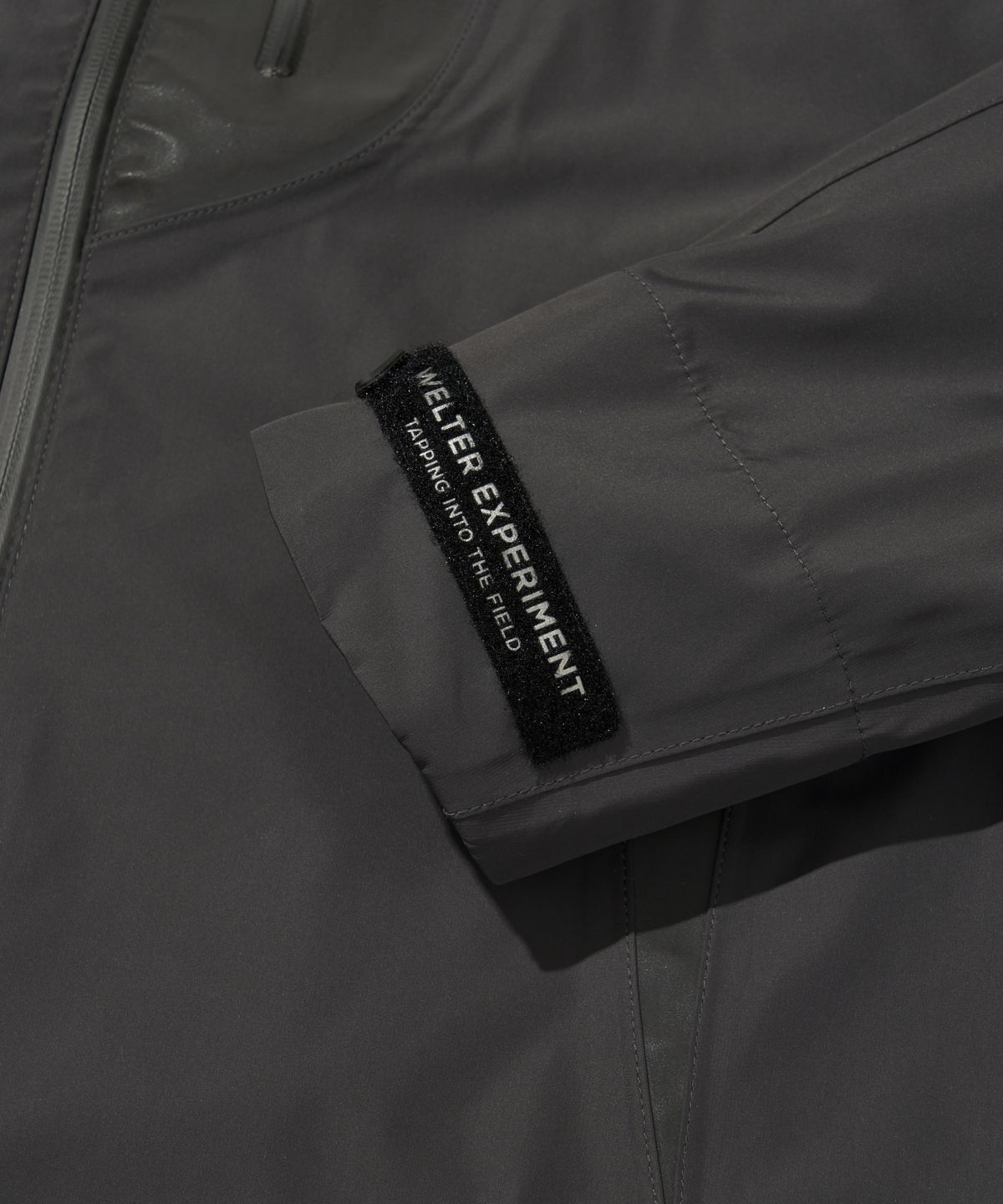 웰터 익스페리먼트(WELTER EXPERIMENT) WOL029_3LAYER NUT HOOD SHELL JACKET_Charcoal